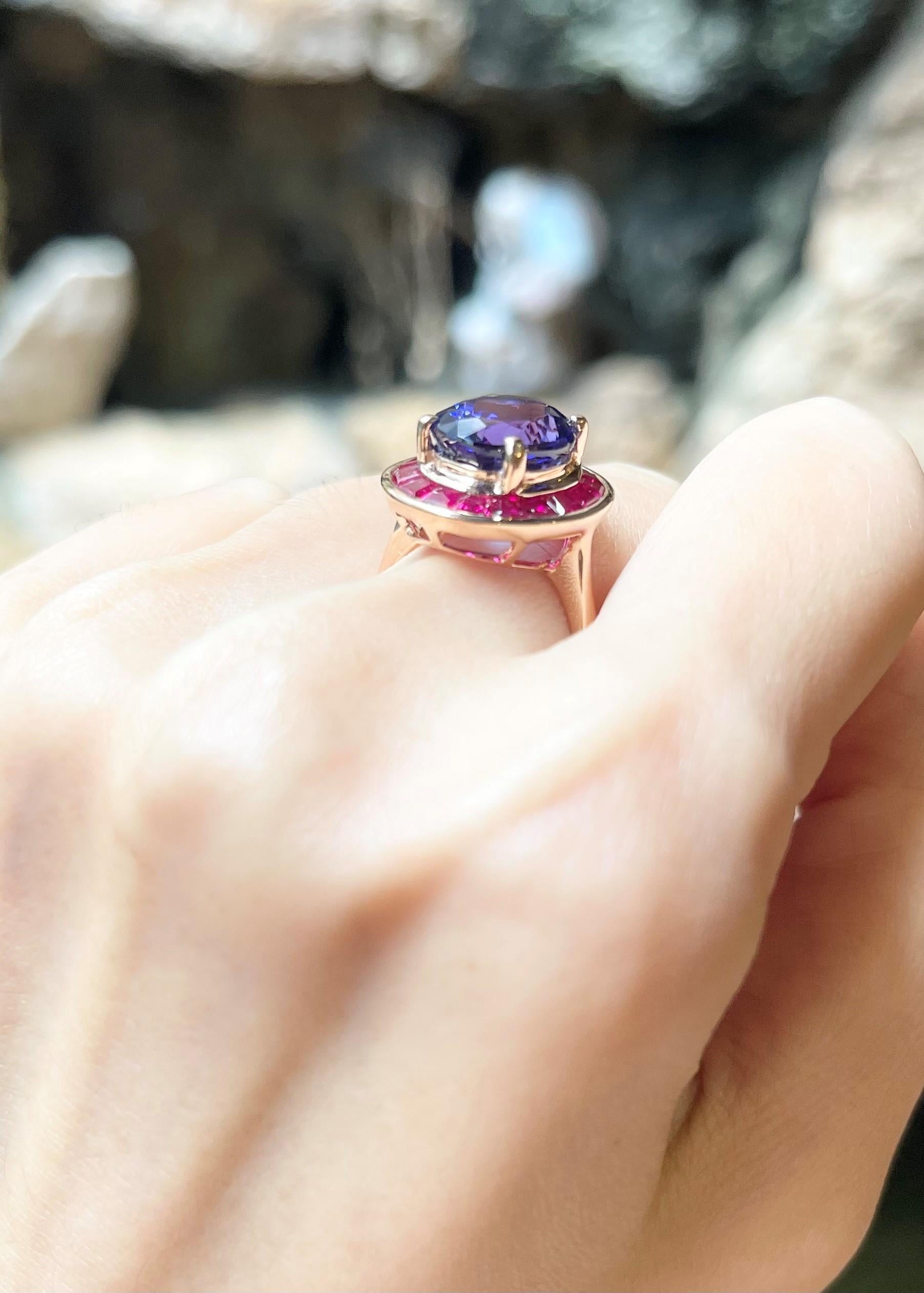 Tanzanite 6.17 carats with Ruby 2.10 carats Ring set in 18K Rose Gold Settings

Width:  1.5 cm 
Length: 1.8 cm
Ring Size: 54
Total Weight: 7.47 grams

