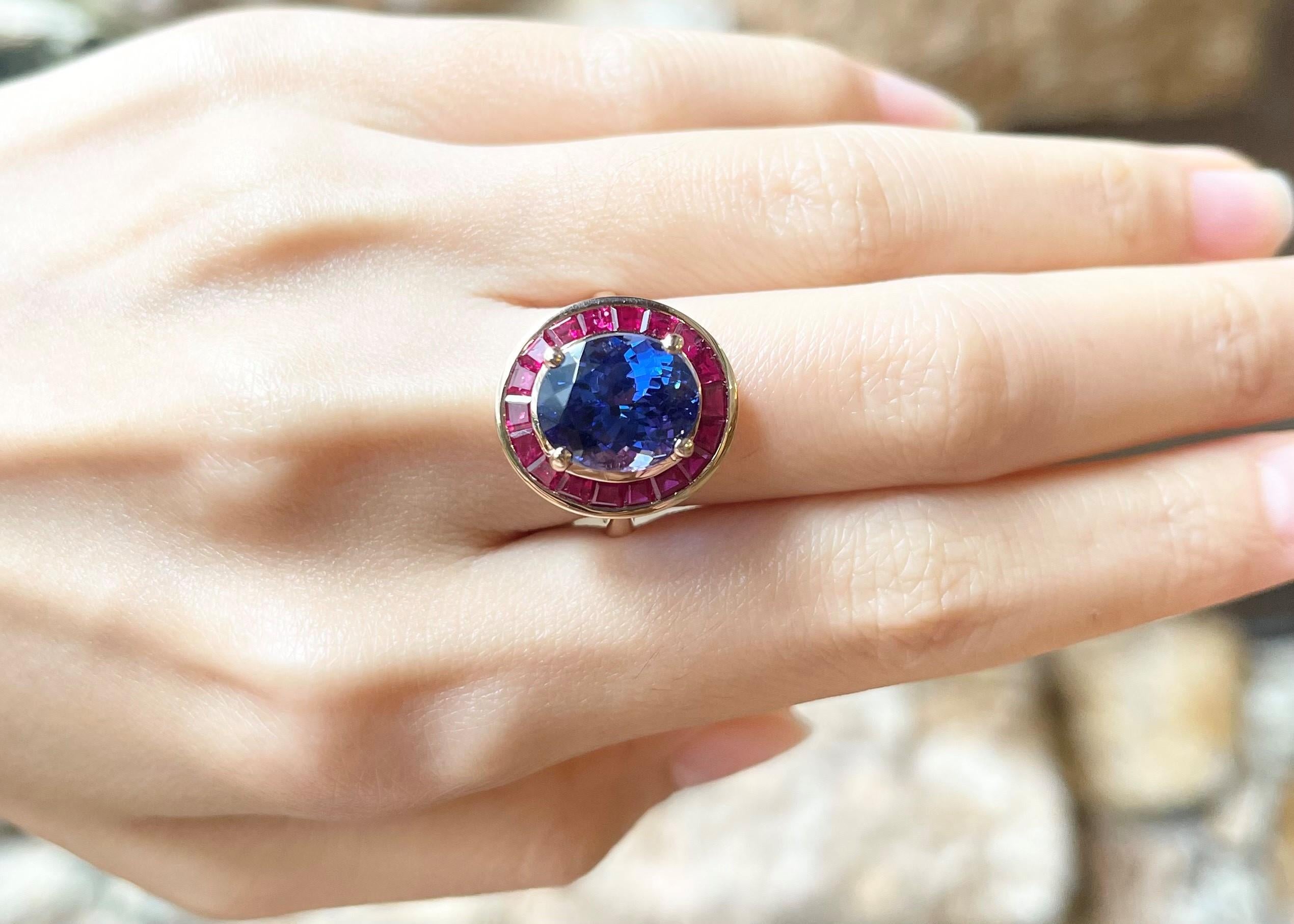 Contemporary Tanzanite with Ruby Ring set in 18K Rose Gold Settings For Sale