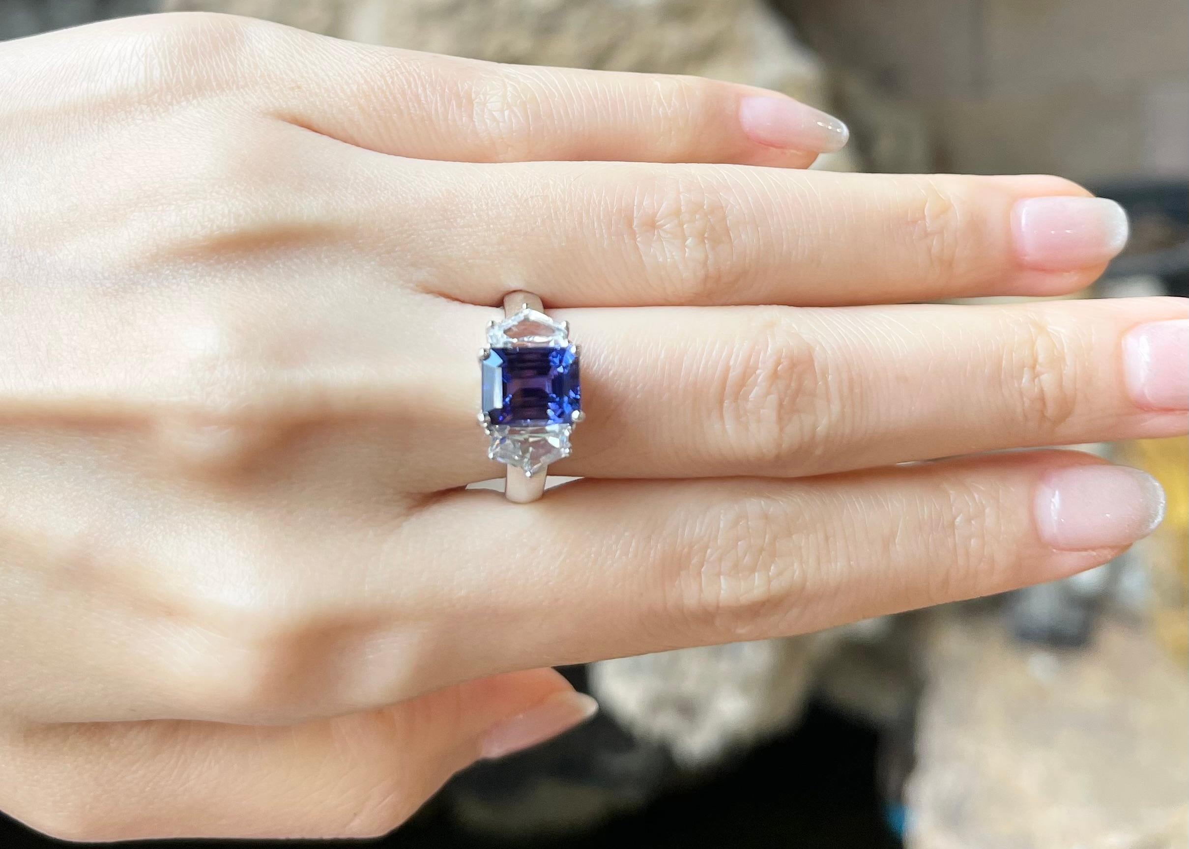 Contemporary Tanzanite with White Sapphire Ring set in 18K White Gold Settings For Sale