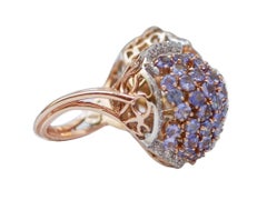 Anello con tanzanite, zaffiri gialli, diamanti, oro rosa 14 carati e oro bianco.