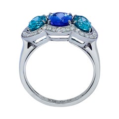 Bague en or blanc 18 carats avec tanzanite, zircon et diamants