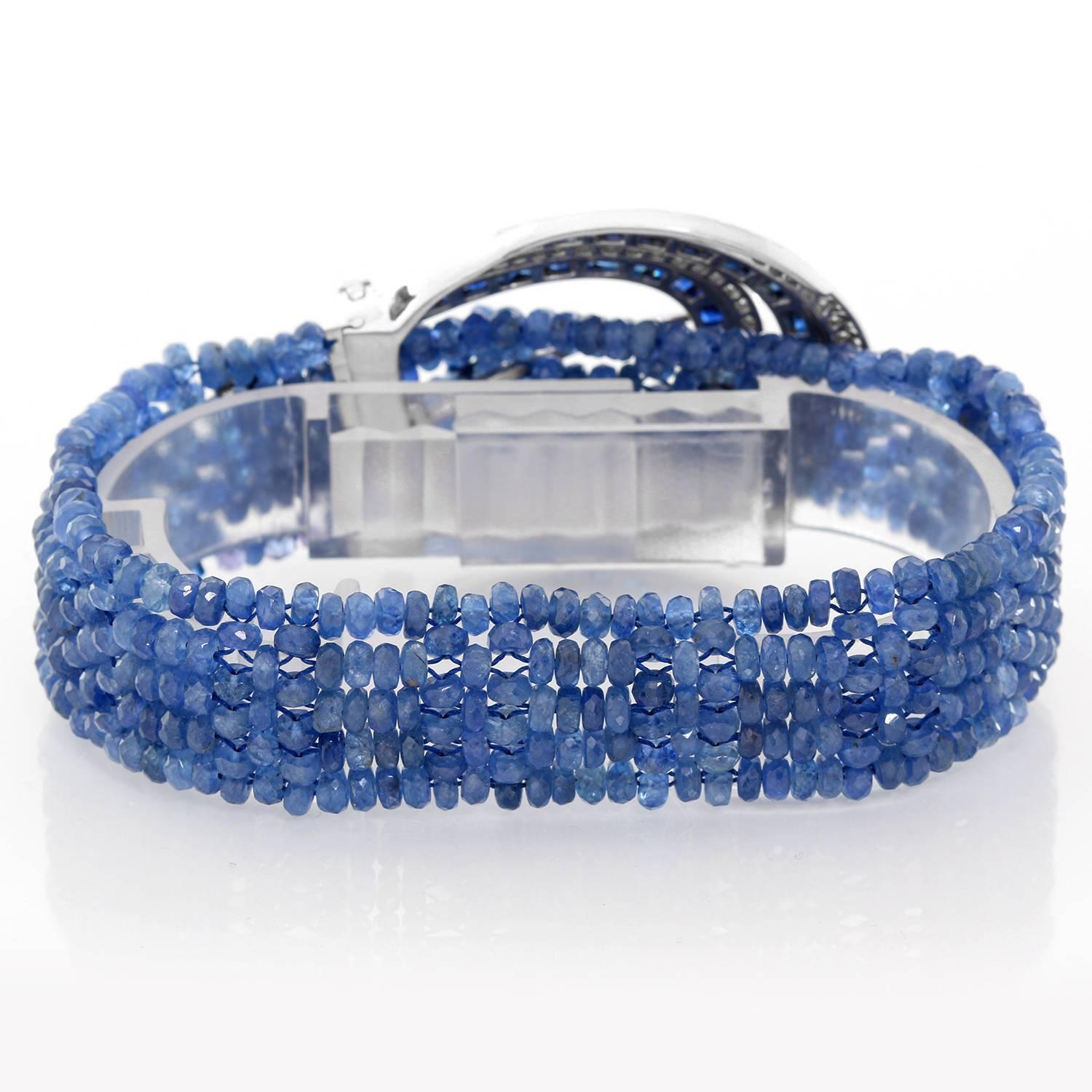 Tanzanite, Diamond and Sapphire 18K White Gold Bracelet - . Rare 18K White Gold buckle bracelet with diamonds on the buckle, weighing 2.55 cts and with Sapphires. Bracelet made out of Tanzanite beads. Adjustable length.