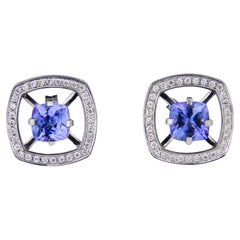 Tanzanites 14k gold earrings studs.