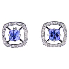 Tanzanites 14k gold earrings studs. 