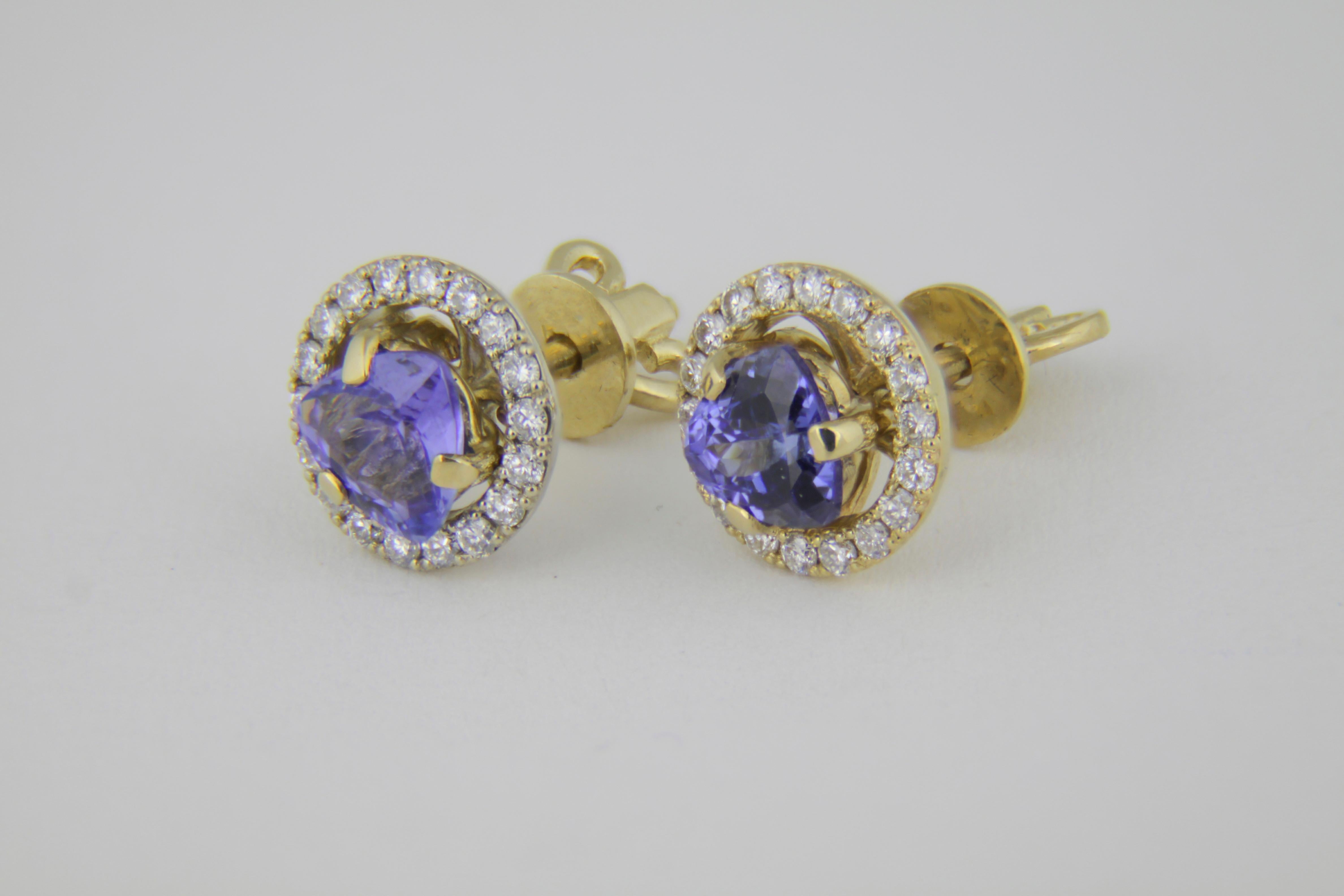 Trillion Cut Tanzanites and diamonds 14k gold earrings studs. For Sale