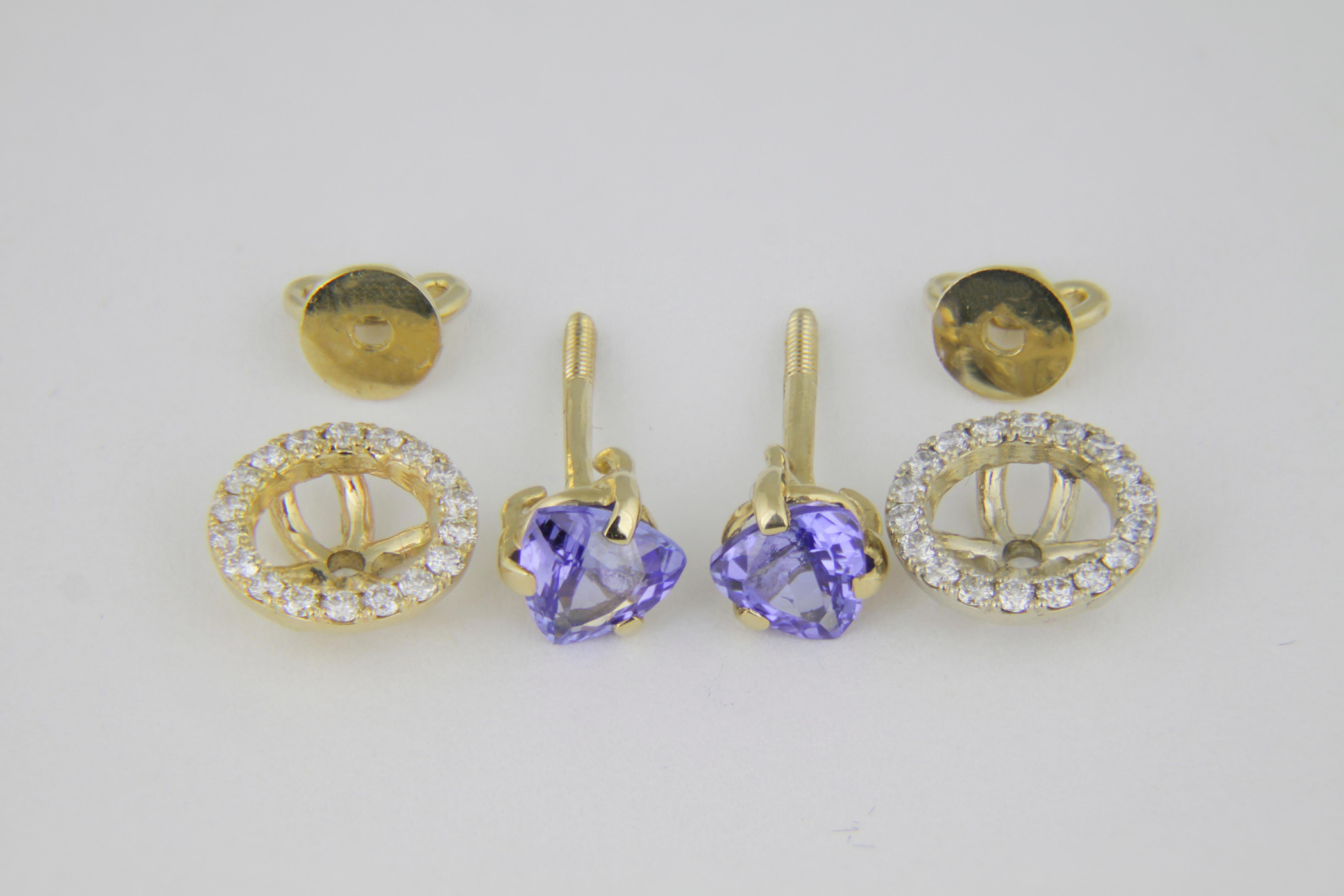 Women's Tanzanites and diamonds 14k gold earrings studs. For Sale