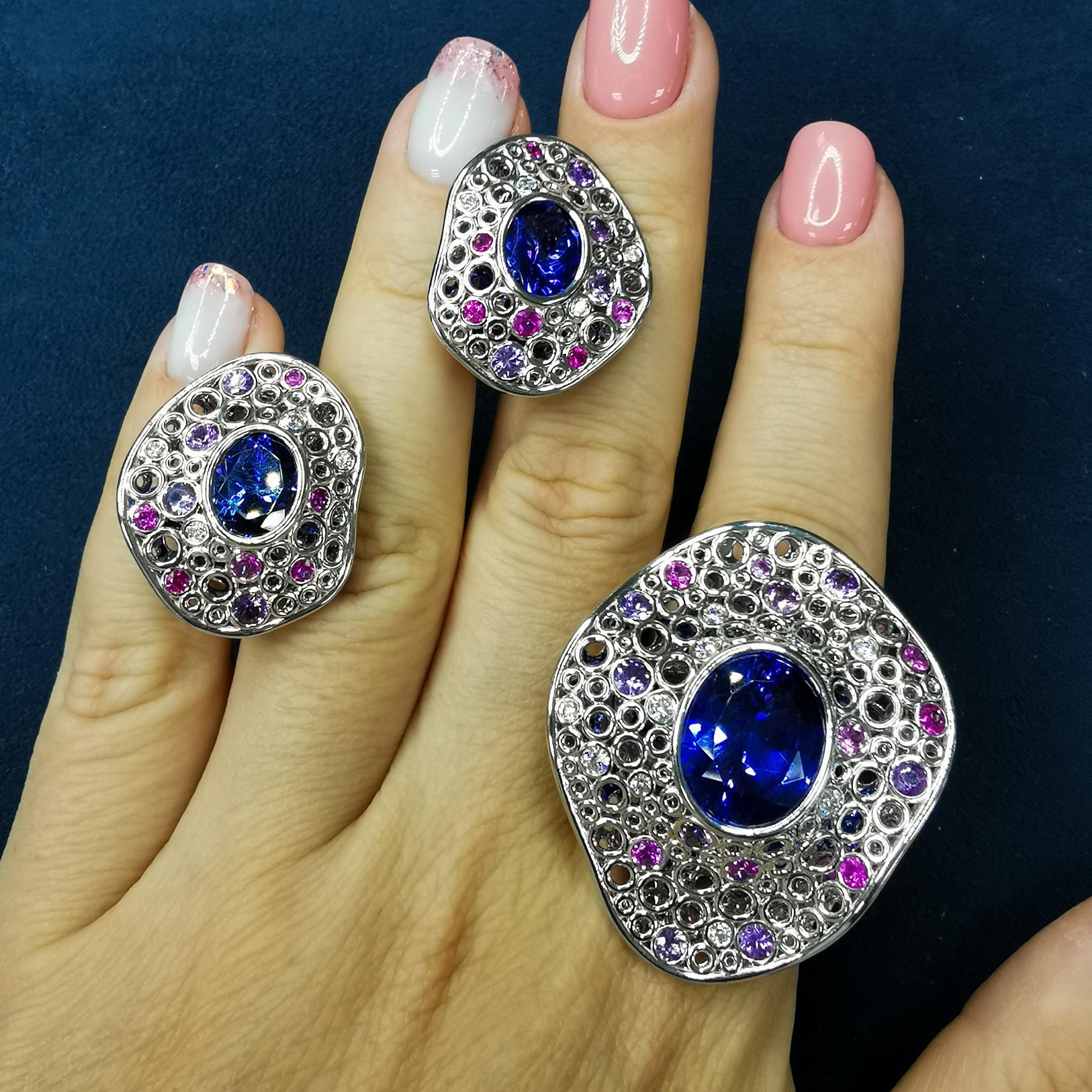 Tanzanites Diamonds Sapphires 18 Karat White Gold Bubble Suite
Incredibly light and airy Suite from our Bubbles Collection. White 18 Karat Gold is made in the form of variety of small bubbles, some of which have Pink and Purple Sapphires and