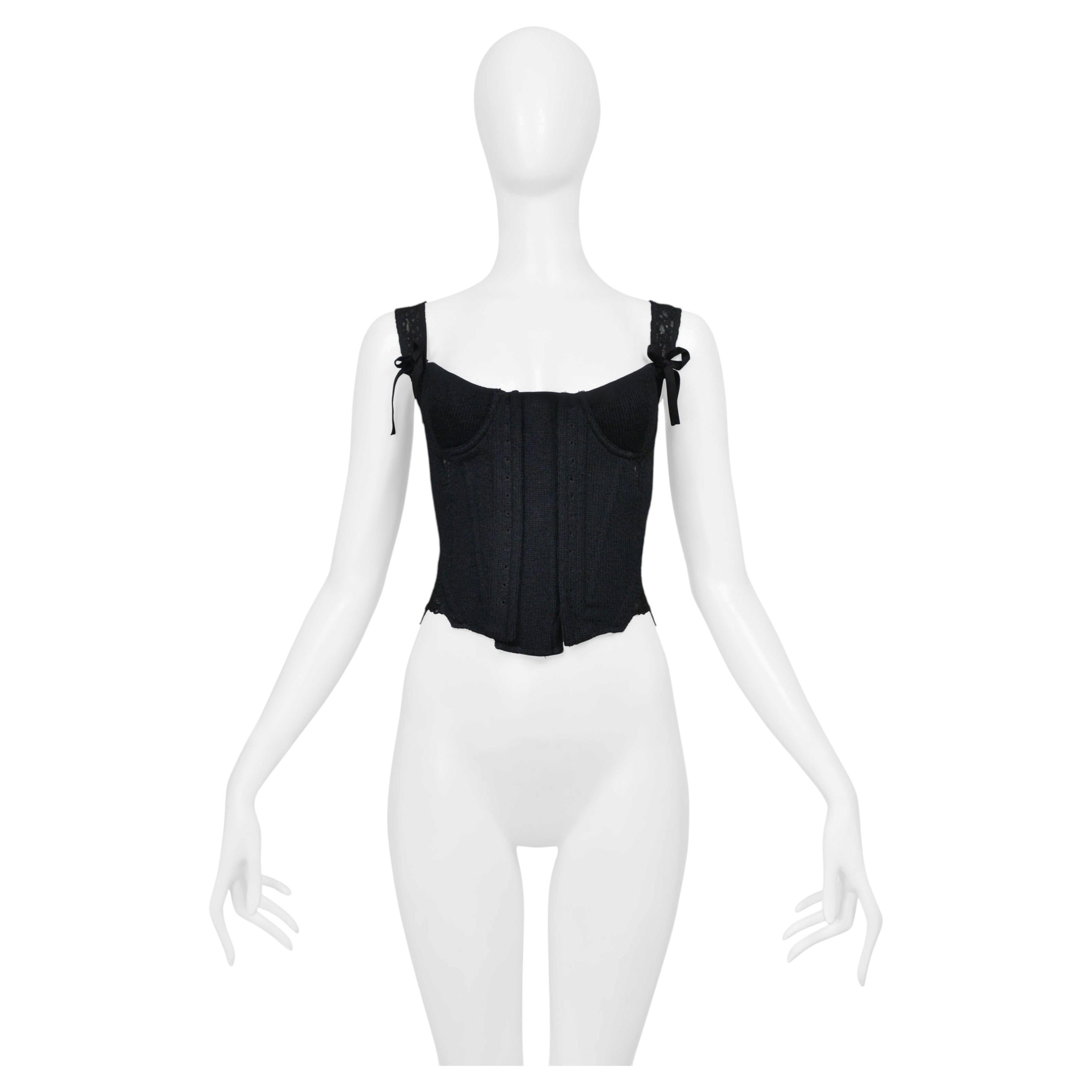 Top corsé de punto negro de Tao para Comme des Garçons, con lazos de terciopelo y volantes en venta
