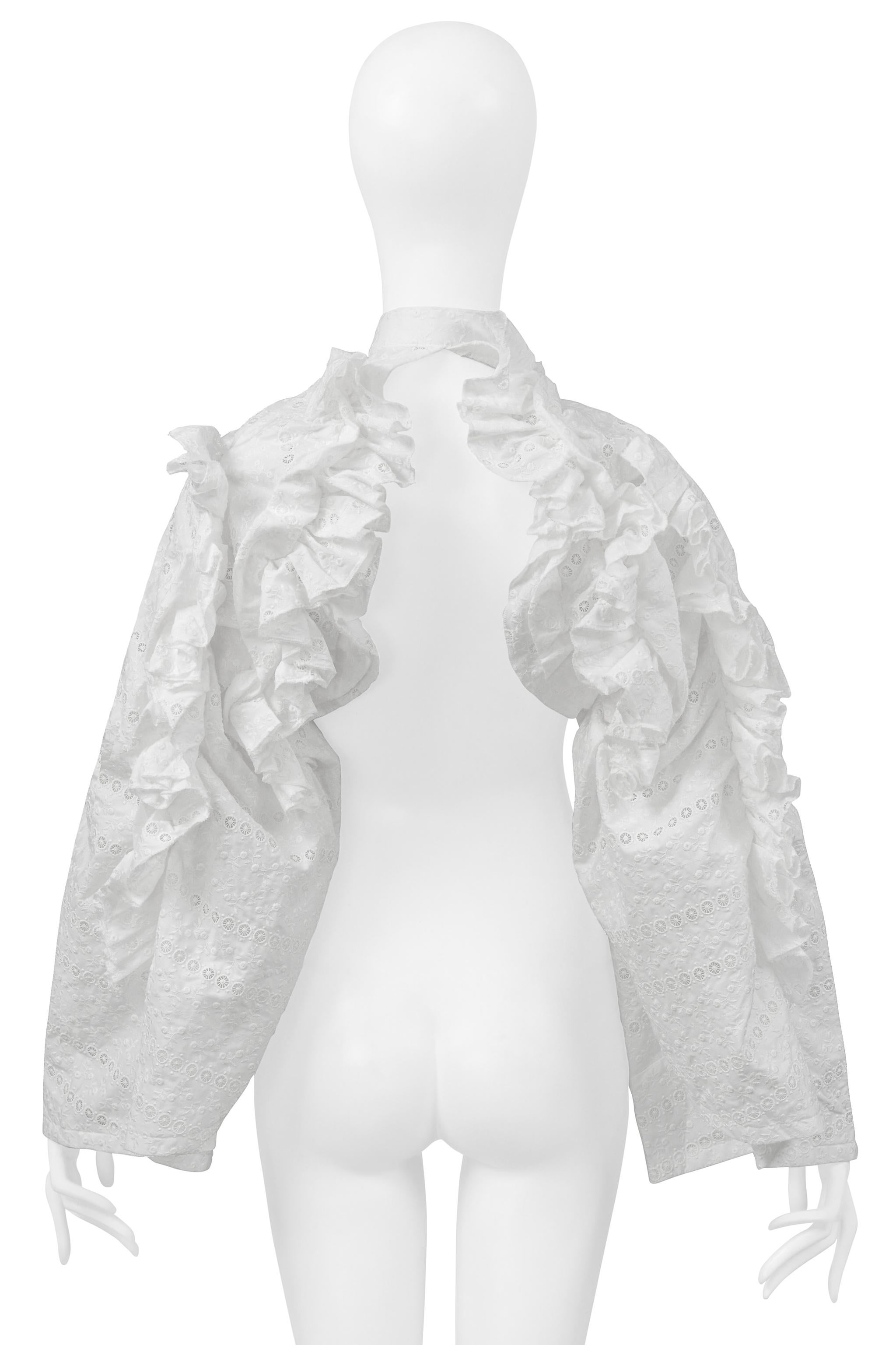 Resurrection Vintage is excited to offer a vintage Tao for Comme des Garçons white lace bolero featuring delicate eyelet lace, a tie-neck closure, flared sleeves, and ruffle sleeves.

* Tao For Comme Des Garçons
* Size: One Size
* Fabric: 100%