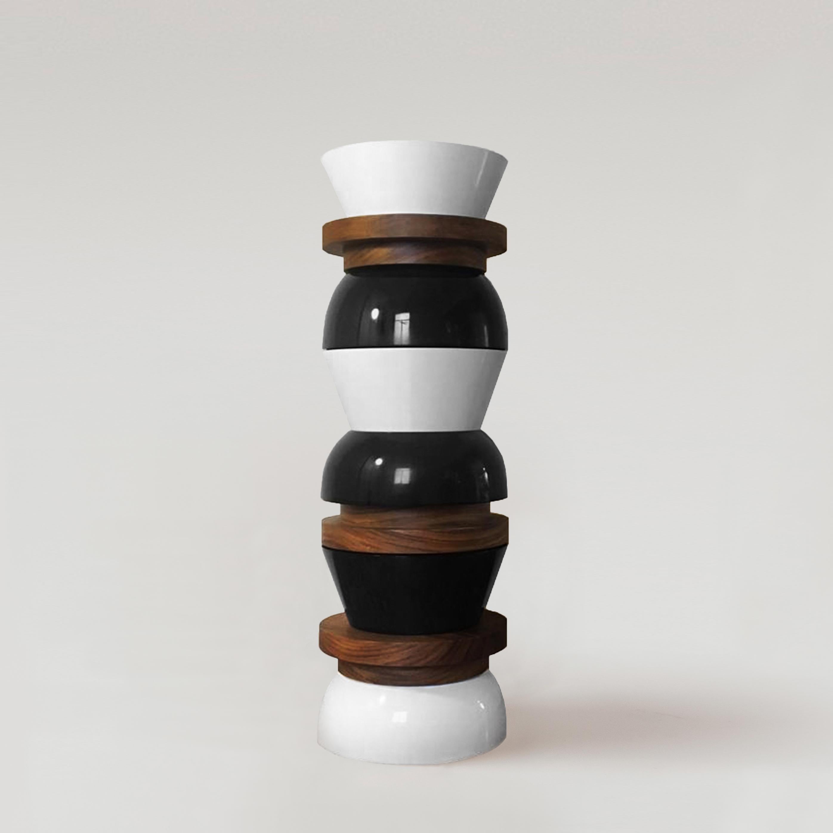 Utility Sculpture:
1 TAO, functions as a stool/table 
Create your own TOTEM by stacking 3 or 4 TAOS!
Material: Radiata and Parota wood, high gloss resin finish (Indoors).

Rebeca Cors (México, 1988) works as an independent artist under the name