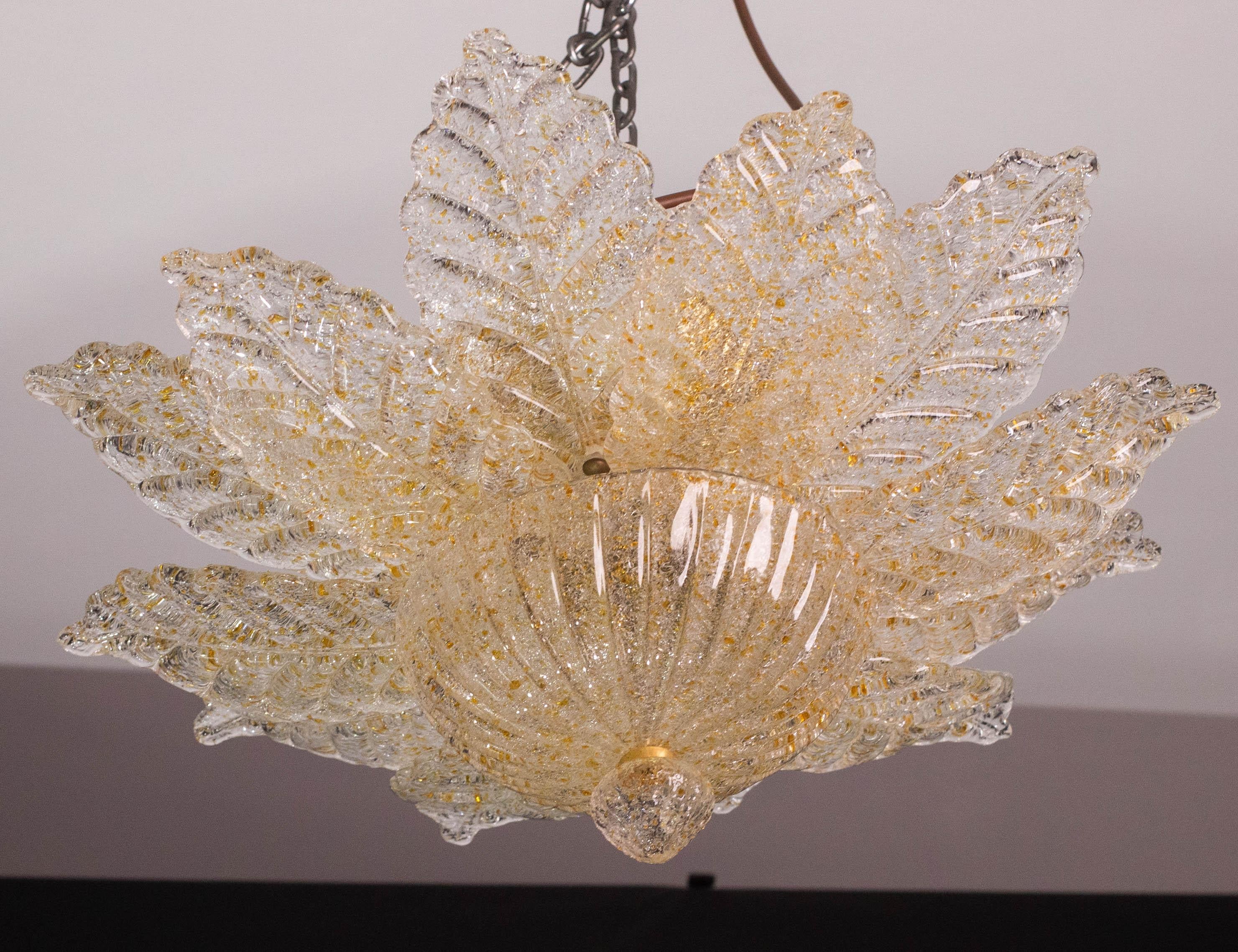 Splendid Murano glass ceiling lamp in coloured glass bead with amber gold\orange hues ispired to the city of Taormina in Sicily.

Period: circa 1970.

The light mounts 6 standard European e14 lamp holders, possible to switch for Usa