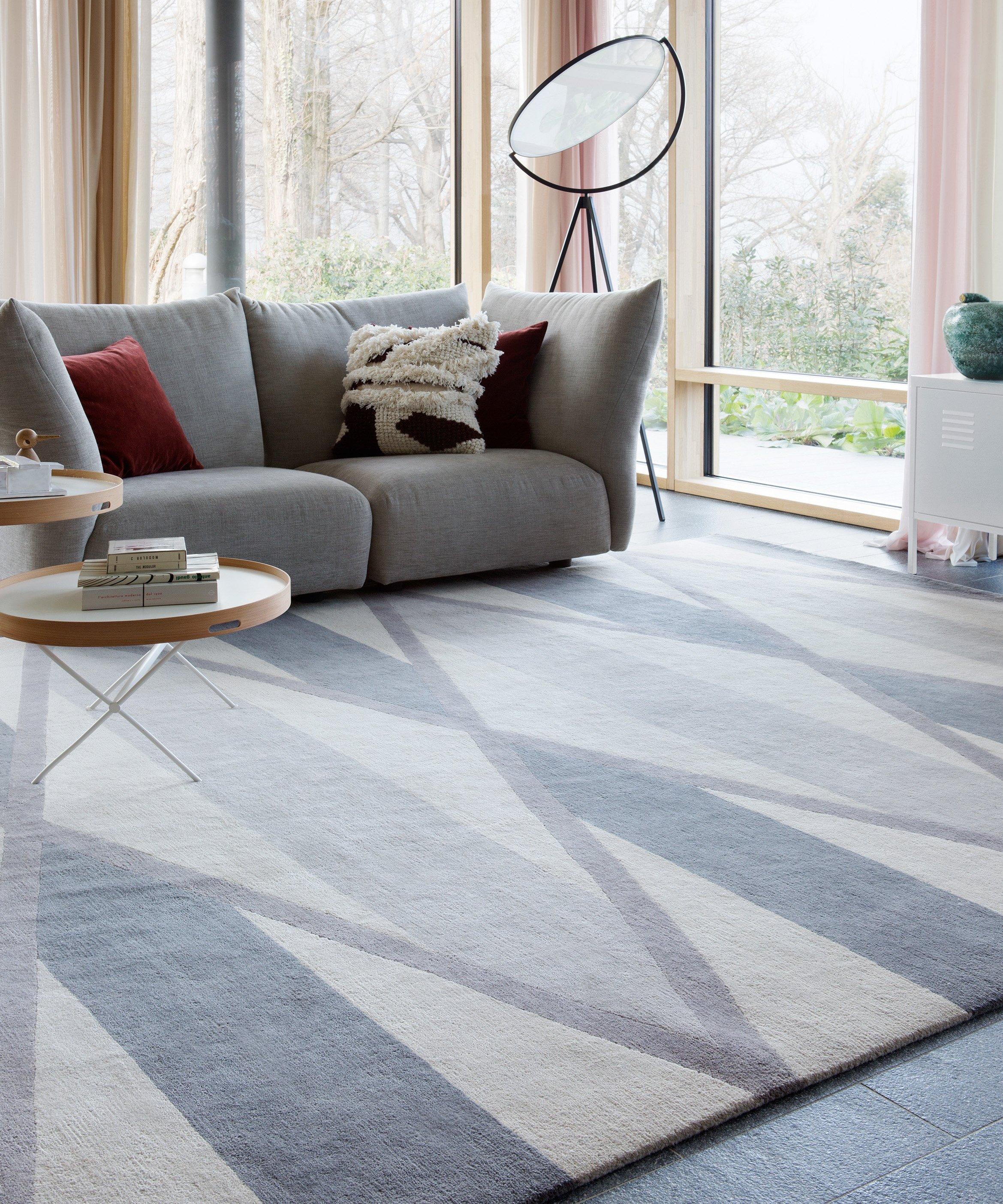 Based on an American quilt pattern and composed of a pared-back palette of muted grey and cream, Taos combines diamonds and lines in perfect proportion to create a mirrored effect. Hand-knotted in the finest Tibetan wool, the rug has undertones of