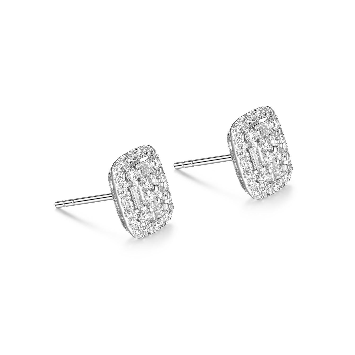Ces boucles d'oreilles en diamant présentent un diamant baguette effilé de 0,31 carat, assorti de diamants ronds de 0,63 carat. Les boucles d'oreilles sont serties en or blanc 18 carats.
Les diamants sont de couleur F et de qualité VS

Diamant