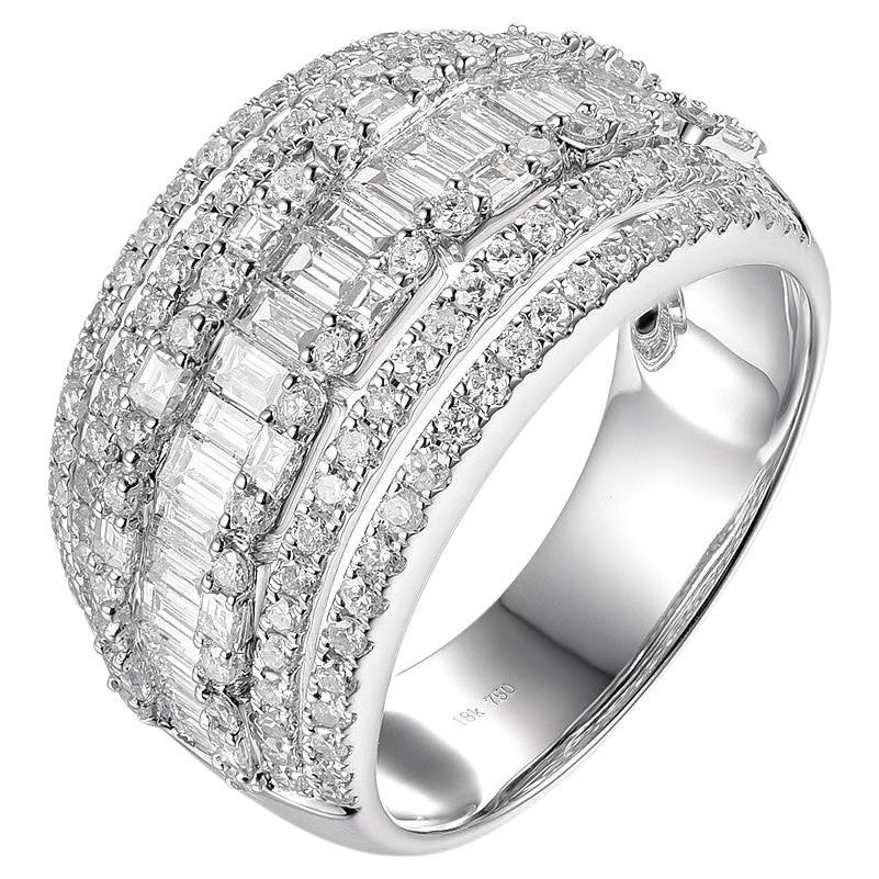 This diamond band ring features 0.93 carat of taper diamonds and 0.79 carat of round diamonds. Diamonds are set in 18 karat white gold. Great for everyday use and it is stack-able with other thinner band rings. 
Taper diamonds F color VS clarity