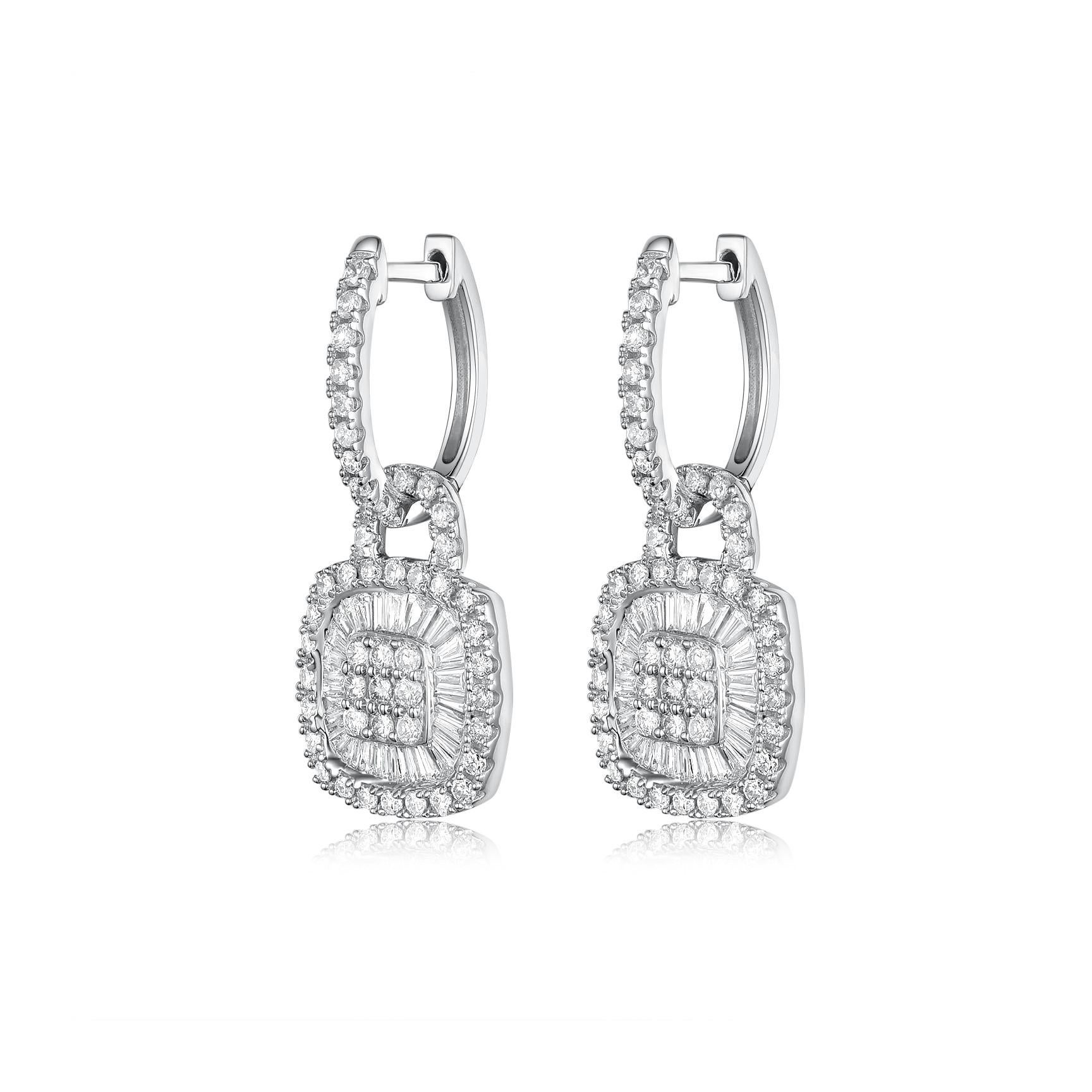 This earrings feature 0.56 carat of tapered diamonds and assented with 0.83 carat of round diamonds. Earrings are set in 14 karat white gold. Yellow gold is also available, feel free to contact us directly or obtain more information in our store