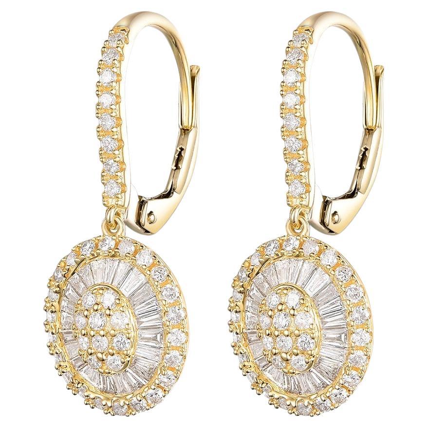 This earrings feature 0.35 carat of tapered diamonds and assented with 0.53 carat of round diamonds. Earrings are set in 14 karat yellow gold.

Taper Baguette Diamonds 0.35 carat
Round Diamonds 0.53 carat
14 Karat Yellow Gold