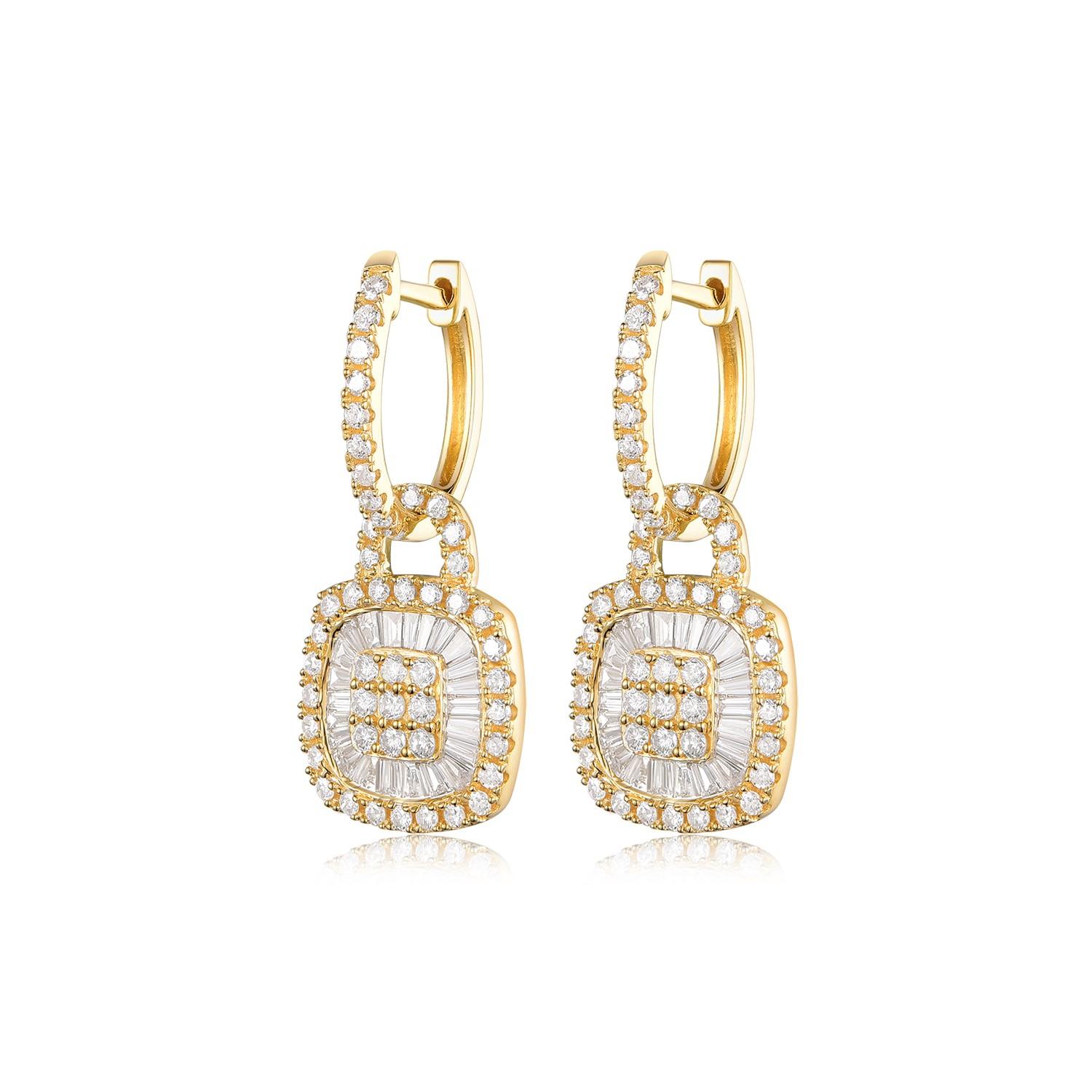 Adorn yourself with the timeless elegance of these expertly crafted earrings. Each piece showcases 0.55 carats of gleaming tapered baguette diamonds, harmoniously complemented by an additional 0.83 carats of round diamonds. Together, they form a