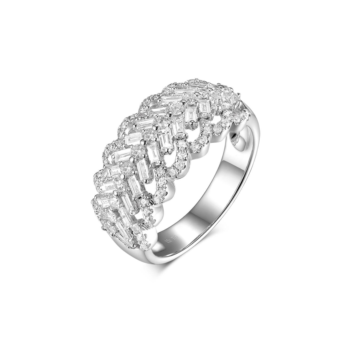 This half band ring features 0.58 carat of taper diamonds and 0.47 carat of round diamonds. Diamonds are set in 18 karat white gold. Great for everyday use and it is stack-able with other thinner band rings. 

US 6.5
Resizing is available
Taper