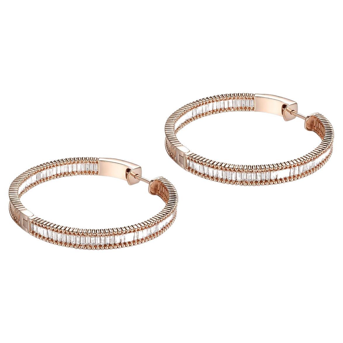 This hoop earrings feature 1.36 carat of taper diamonds. Earrings are set in 18 karat rose gold. Great for everyday use ! 
Diameter 33.6mm 
Taper Diamonds 1.36
18 Karat Rose Gold