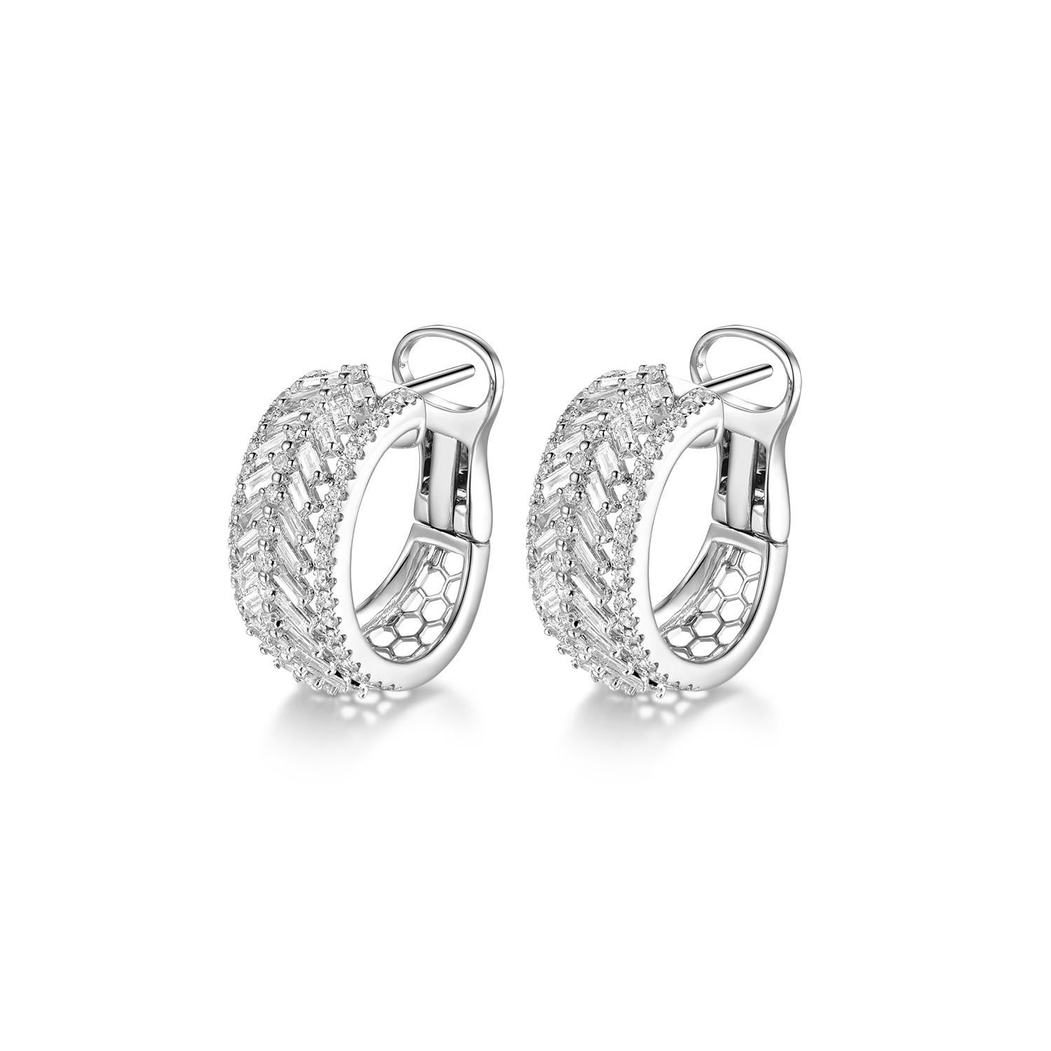 This hoop earrings feature 0.79 carat of taper diamonds, assented with 0.57 carats round diamonds on the side.  Earrings are set in 18 karat white gold.


18 Karat White Gold
Taper Diamonds 0.79 carat 
Round Diamonds 0.57 carat
