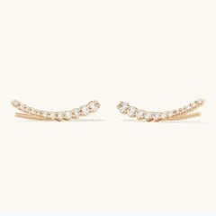 Pendientes trepadores de diamantes cónicos de oro de 18 quilates