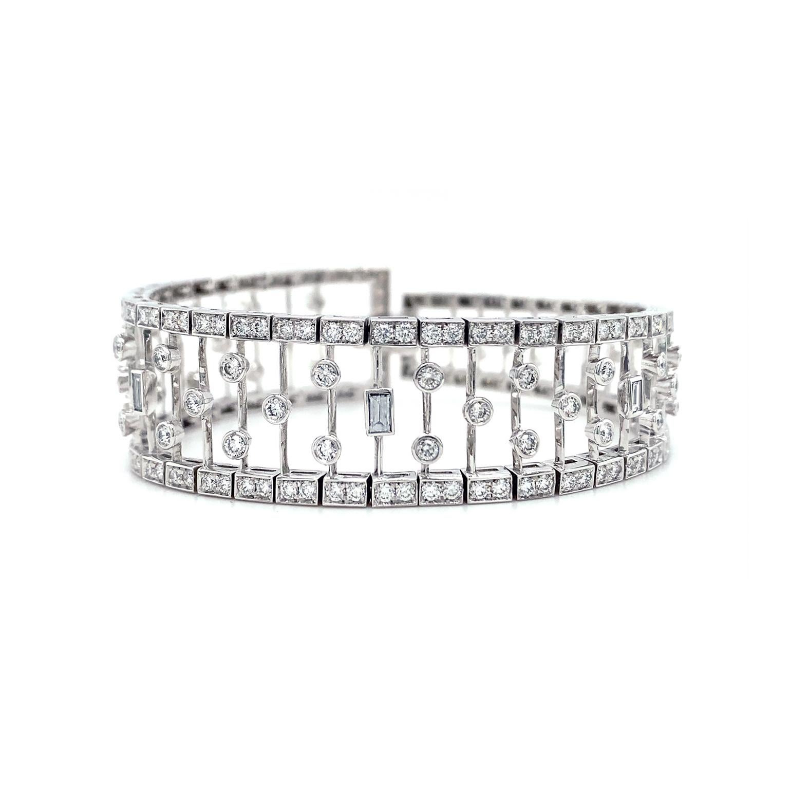 Modern Tapered Baguette and Round Diamond Platinum Bracelet For Sale