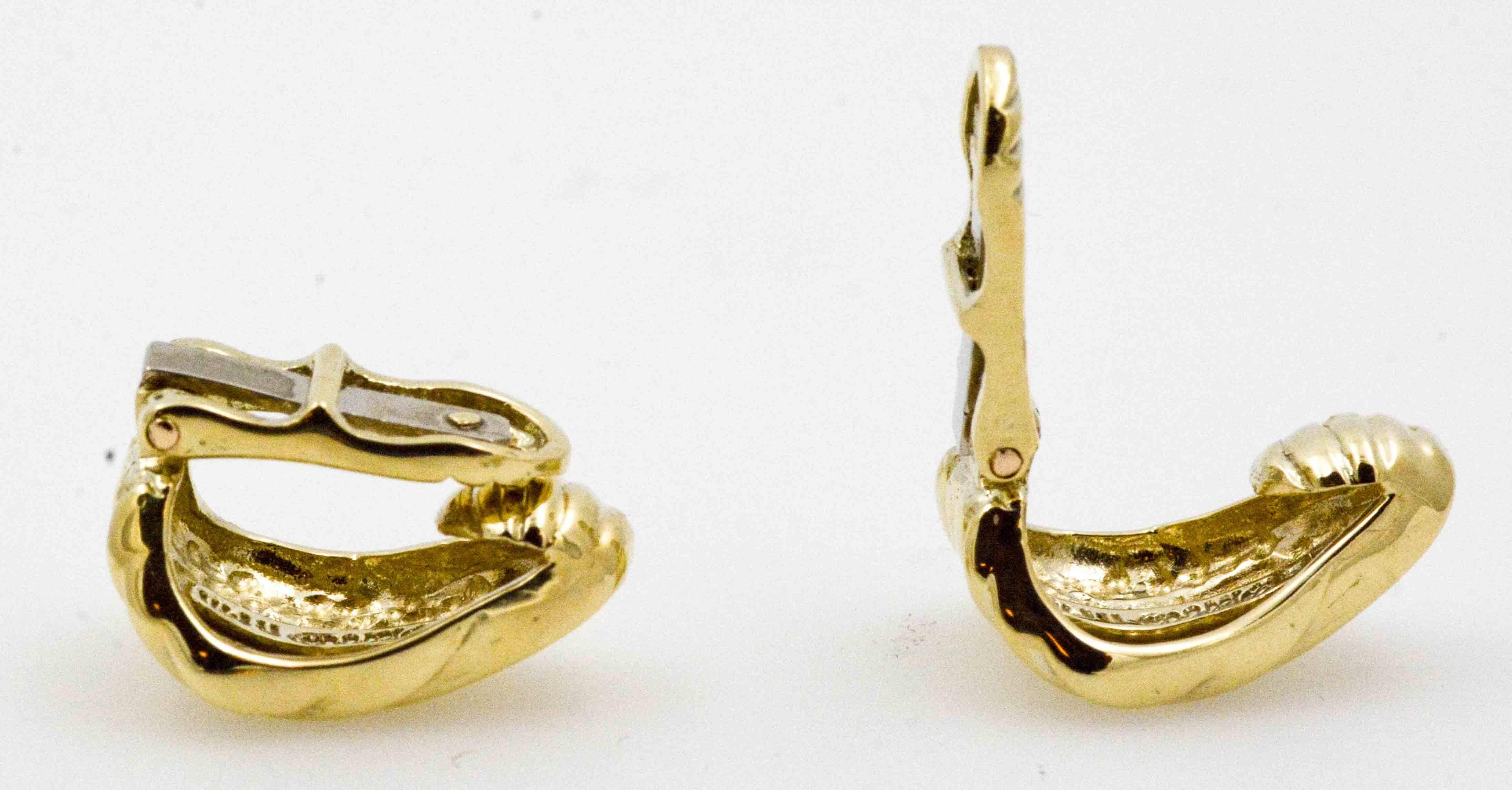 These earrings offer a bit of retro style. Clip on a classic pair of domed half hoop earrings crafted in 14 karat yellow gold. These beautiful earrings have passed our standard of quality and will certainly be a great addition to a fine jewelry