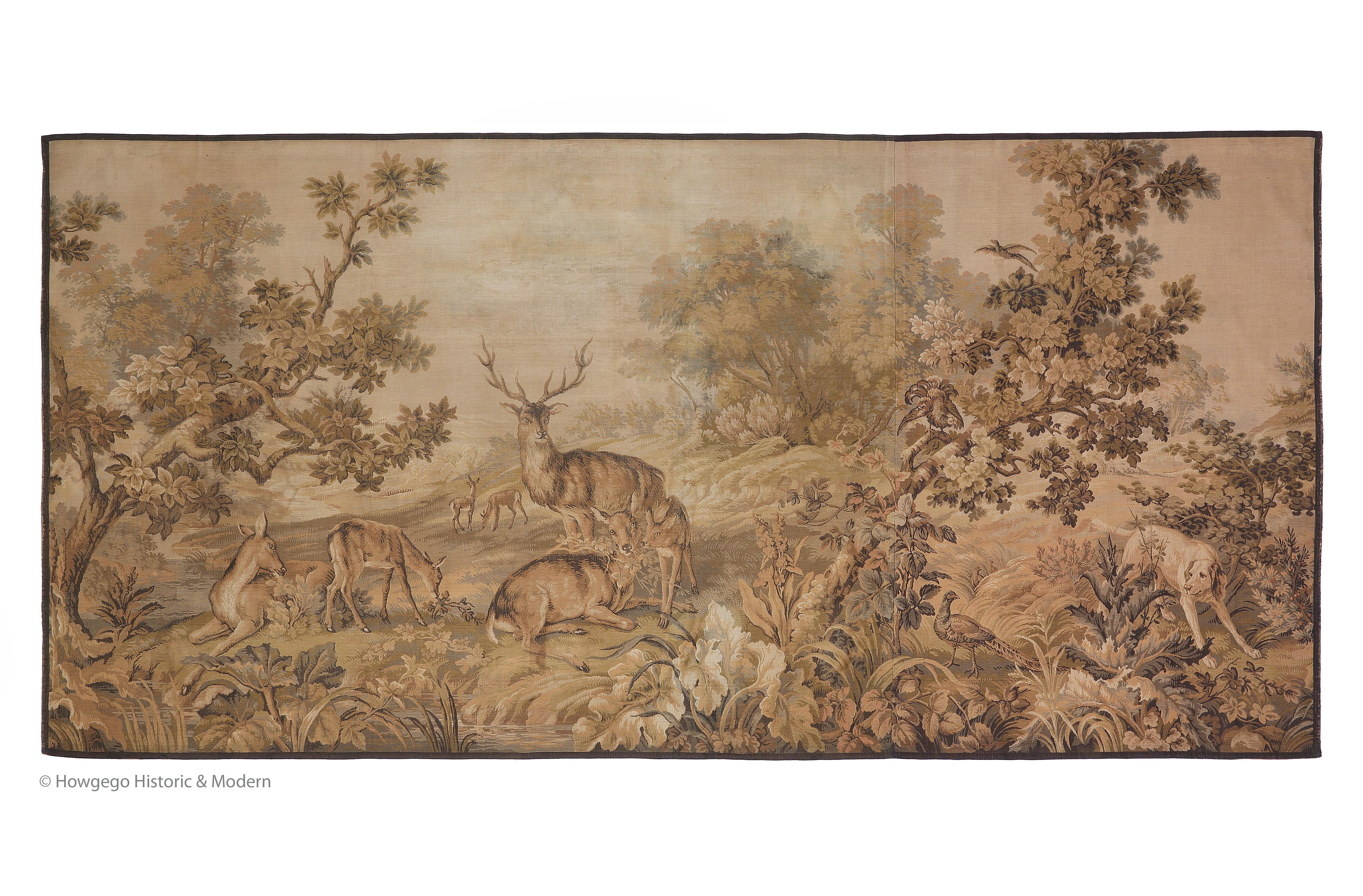 - Massive tapestry with a romanticised woodland sporting scene typical of the period depicting deer, a hound and pheasants.
 - Injects charm and atmosphere into the interior and soft texture and earth palette
- Original size, cleaned, rebacked, a