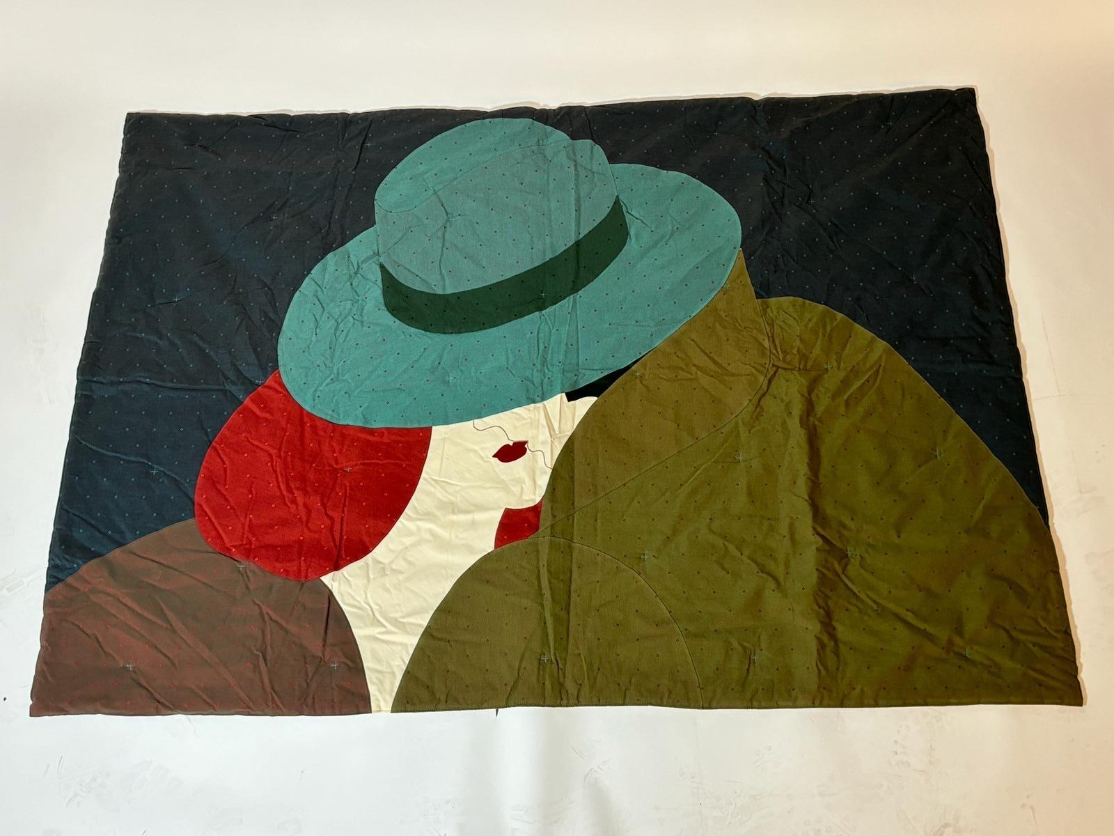 Tapiz  diseñado por Enzo e Elio Mari Panel textil tejido a mano y doblado. Impreso mediante serigrafía. Producción Interflex- Flou, 1999.
Sin soporte de hierro para colgar.

Biografía
Enzo Mari, nacido en Novara en 1932, trabaja en distintas