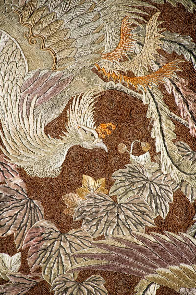 Japanese Tapestry embroidered with polychrome silk threads depicting two flying phoenixes