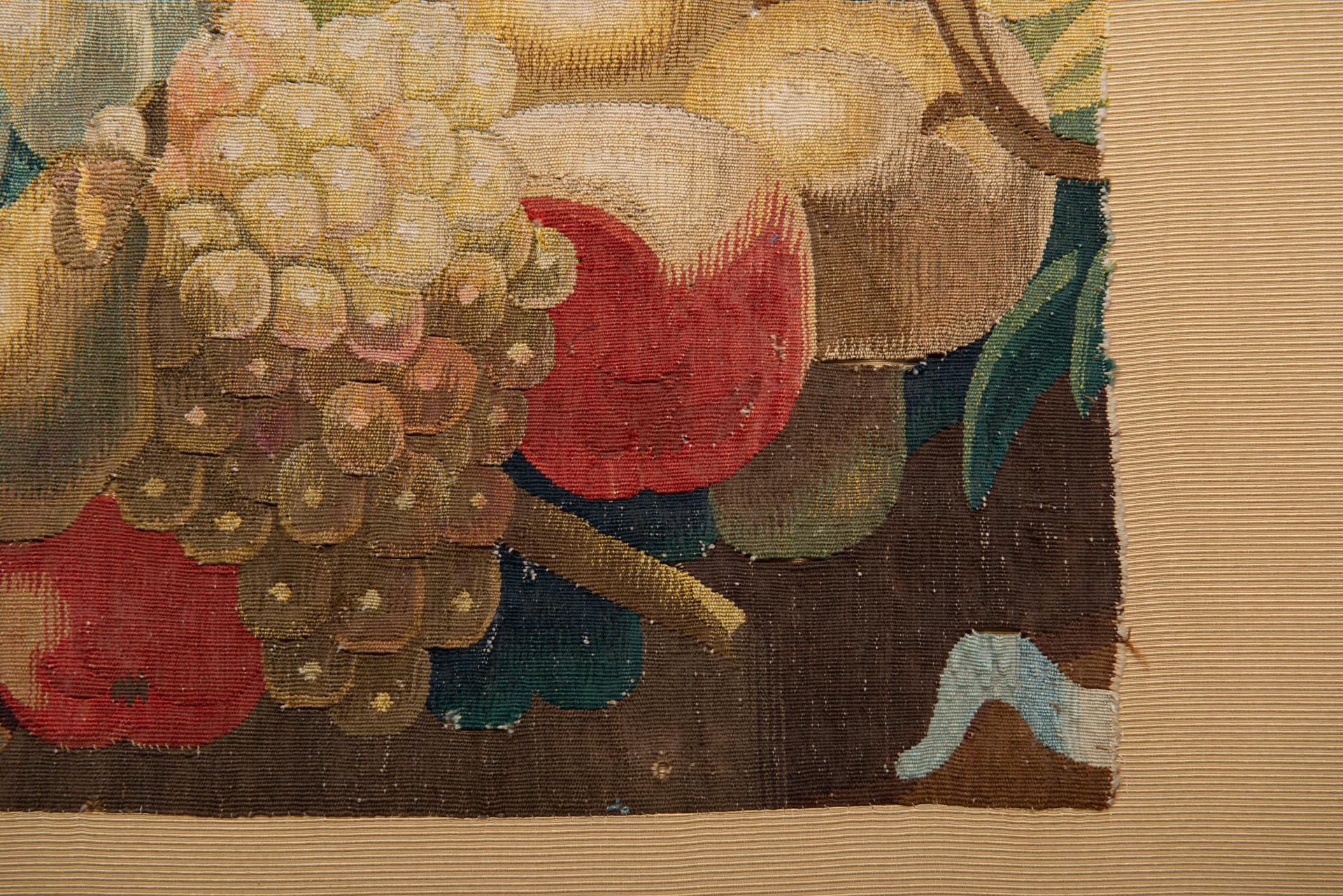 Delightful panel with an ancient fragment of tapestry representing fruits and beautiful colors. I thought of applying it on a panel covered with an excellent fabric: ready to hang.

 