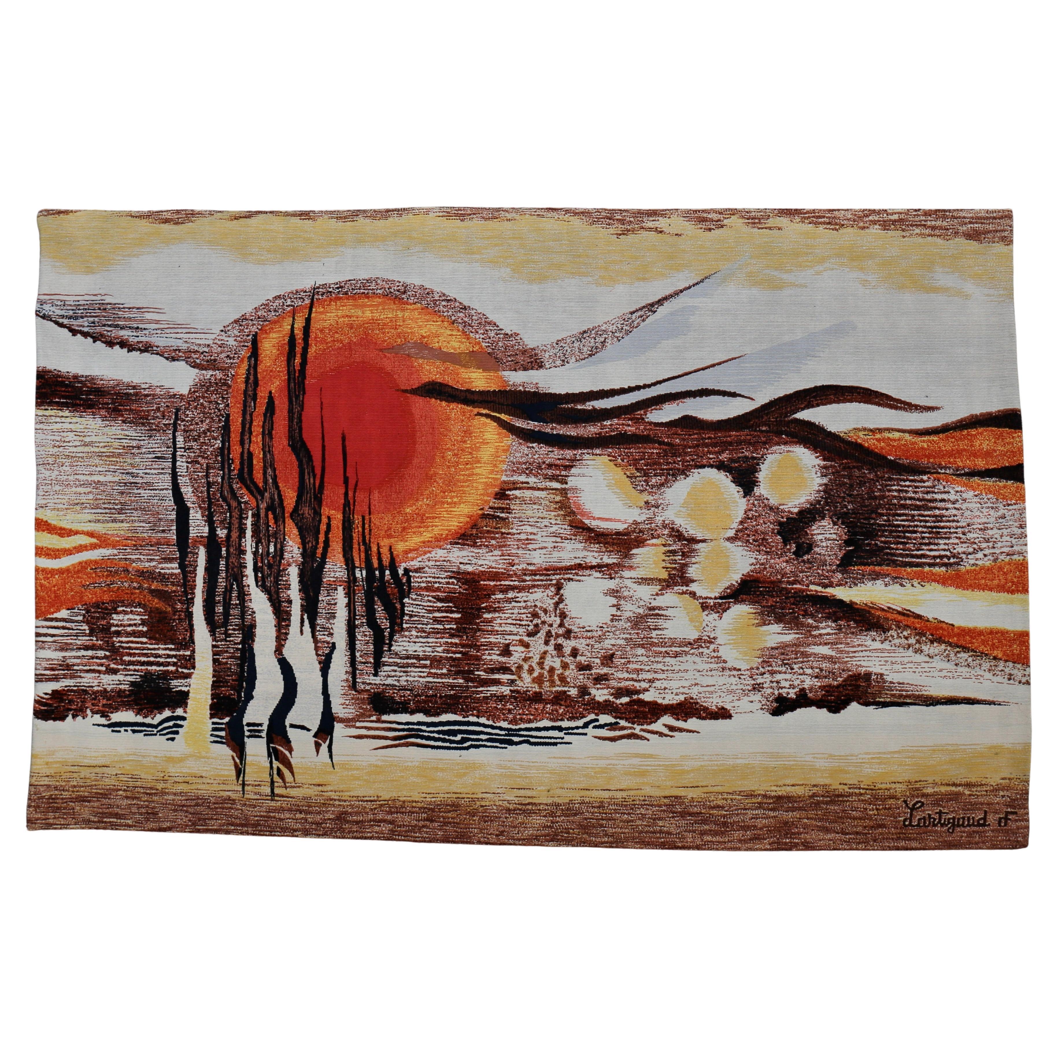 Wall hanging: serigraphy on wool - Terre de Feu - signed Jean-Michel Lartigaud (1949)

“Terre de Feu” decorative hanging tapestry by Jean-Michel Lartigaud depicting a landscape scene in the twilight hour. It is handwoven using wool material. The