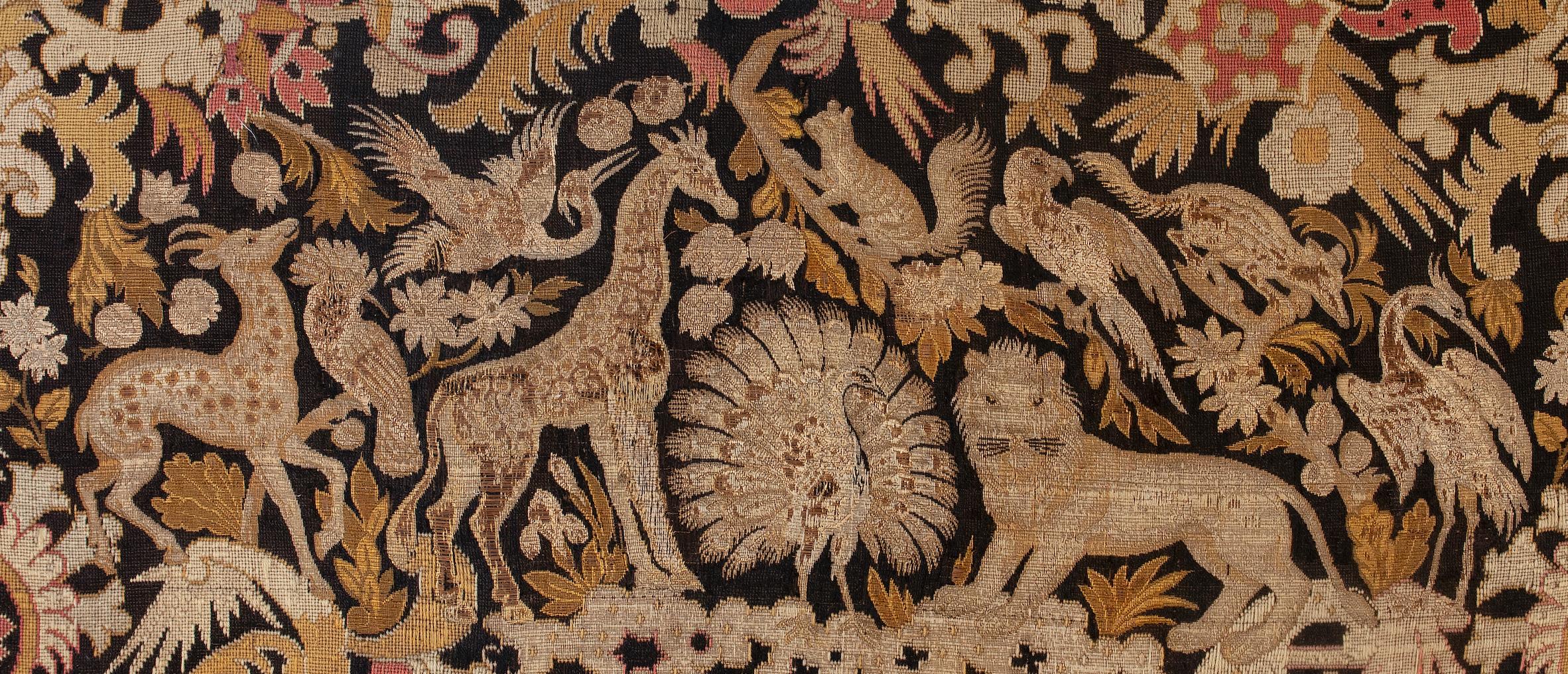 Rare folk, naive, vernacular tapestry
- Mythical quality depicting reminiscent of a garden of paradise with the animals and birds in harmony with each other.
- Charming tapestry depicting a peacock, girafe, lion, deer and exotic birds within a