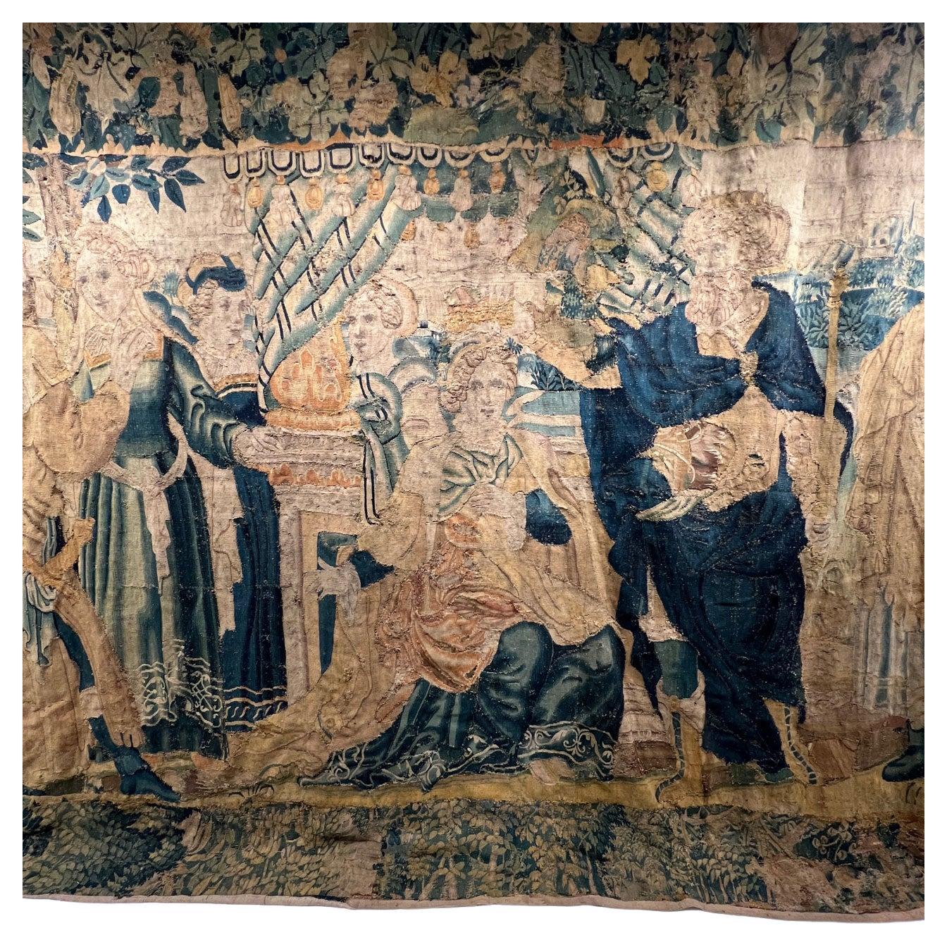 Large woven tapestry depicting the coronation of a Queen. Comes from Belgium and dates from the 17th Century. A few repairs and reweaving.