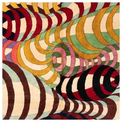 Wandteppich,	mit	Spiralmuster	und	Wolle.