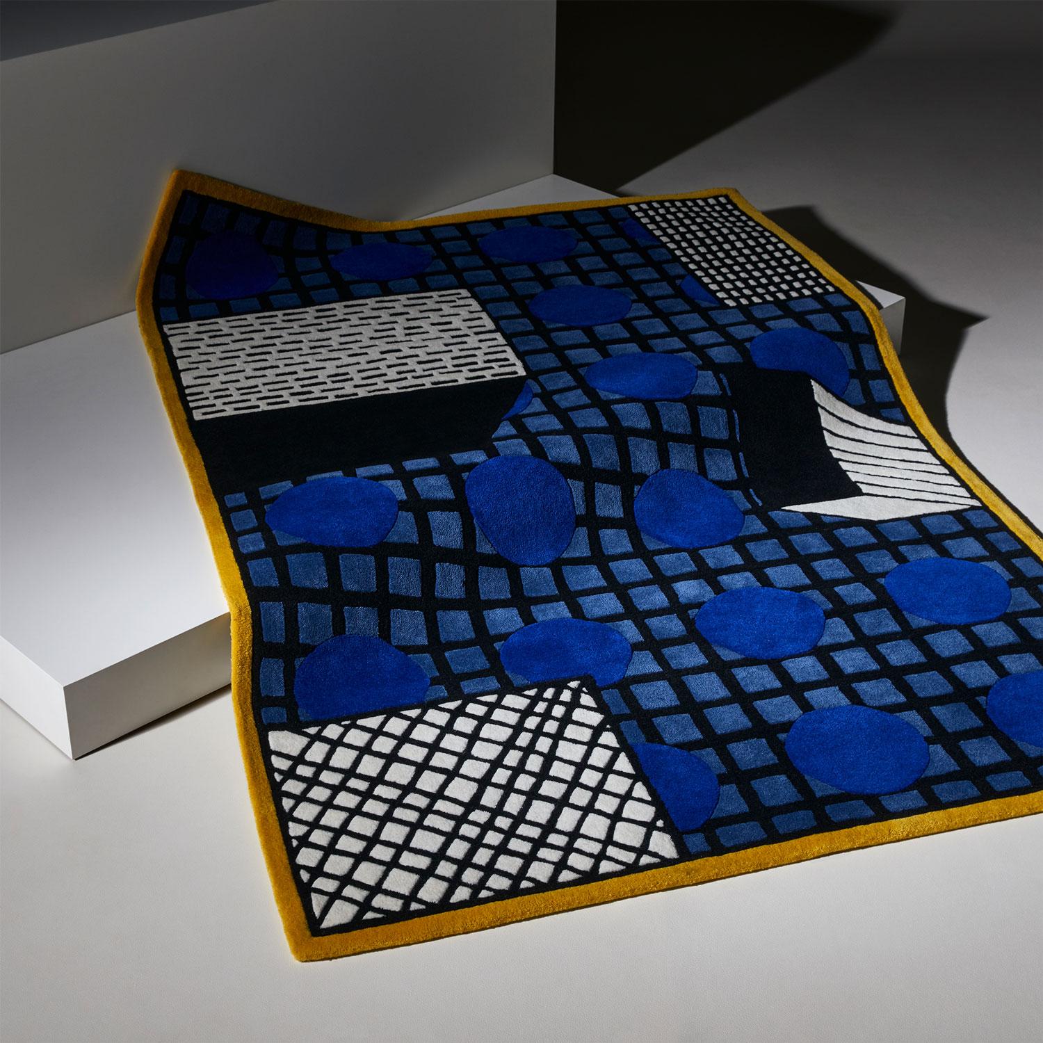 Tapigri rug by Nathalie Du Pasquier
Dimensions: 170 x 240 cm
Made to order creations can be done: 

Tapigri is a construction of layered geometric patterns topped by 3 elements that give the rug an almost architectural presence.

 
Each rug