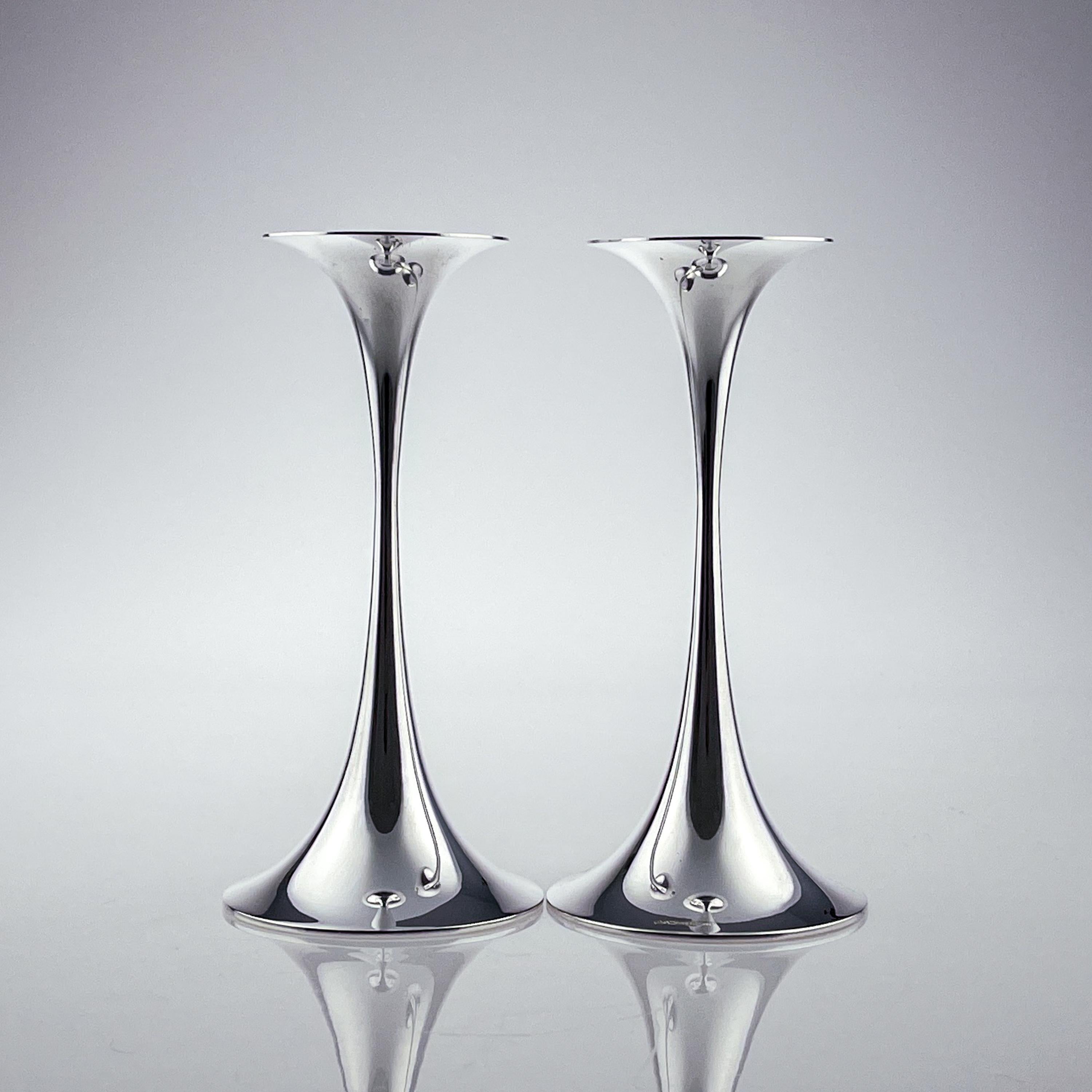 Tapio Wirkkala, A largest size pair of silver “Trumpetti” candlesticks, 1982

A largest size pair of silver “Trumpetti” candlesticks model TW 284, designed by Tapio Wirkkala in 1963. Executed by the craftsmen of Kultakeskus Oy in the town of