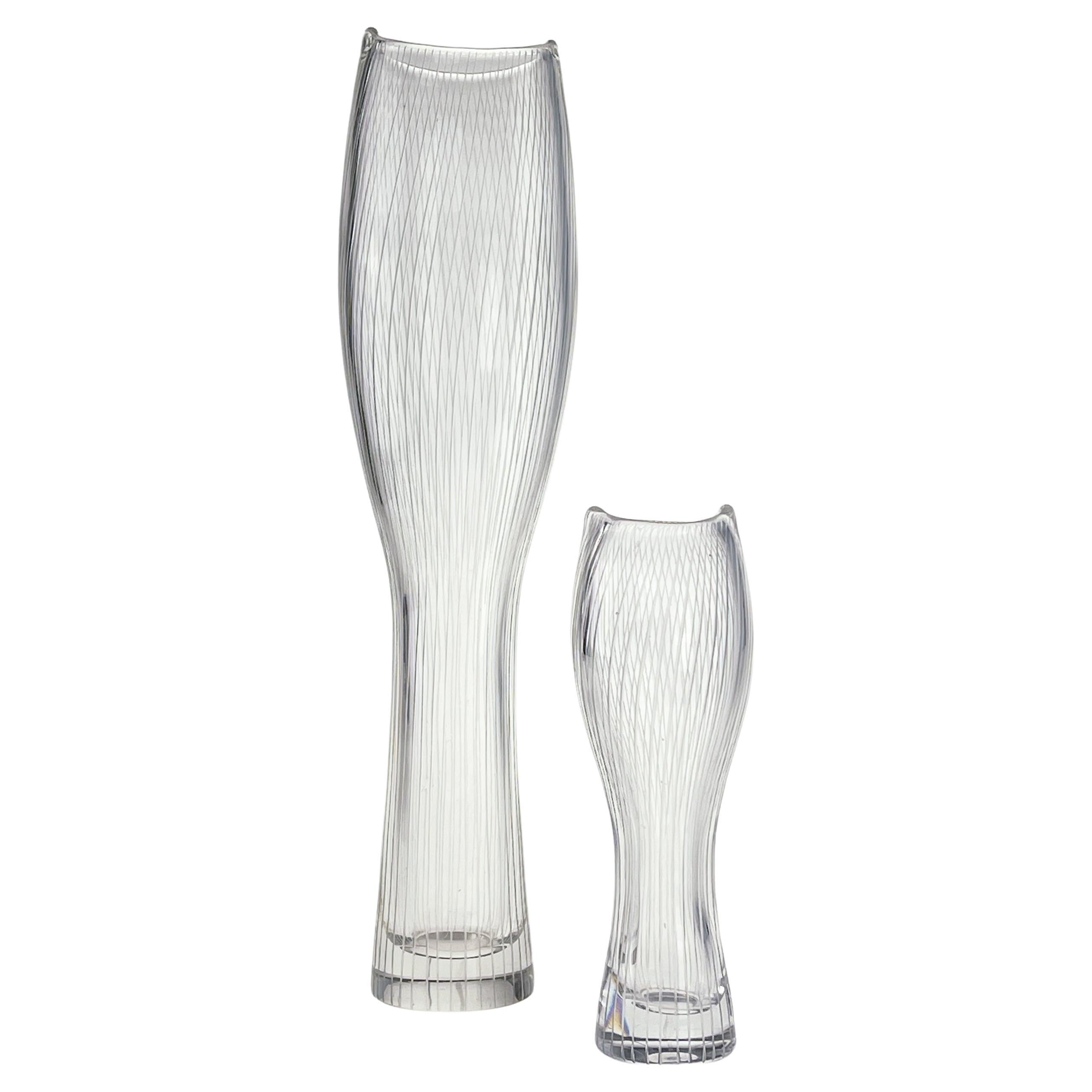 Tapio Wirkkala - A set of both sizes crystal art-object, model 3545 - Iittala Finland 1957 & 1958.

Two turned mold-blown crystal art-objects with spiraled cut lines. These art-objects are model 3545 in the oeuvre of Tapio Wirkkala. It was