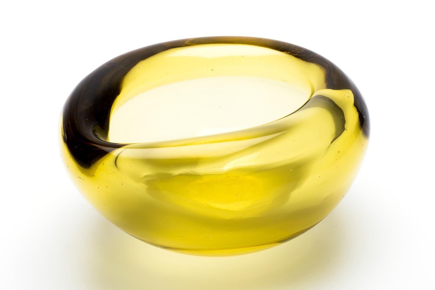 Designed in 1947, manufactured 1948-1949.
One of the first designs in IITTALA.
Thick-walled yellow crystal glass, unusual for a TAPIO WIRKKALA piece.
Signed TaPIO WIRKKaLa - IITTaLa, with only the 'a' in lower case, adopted in the late 1940s.