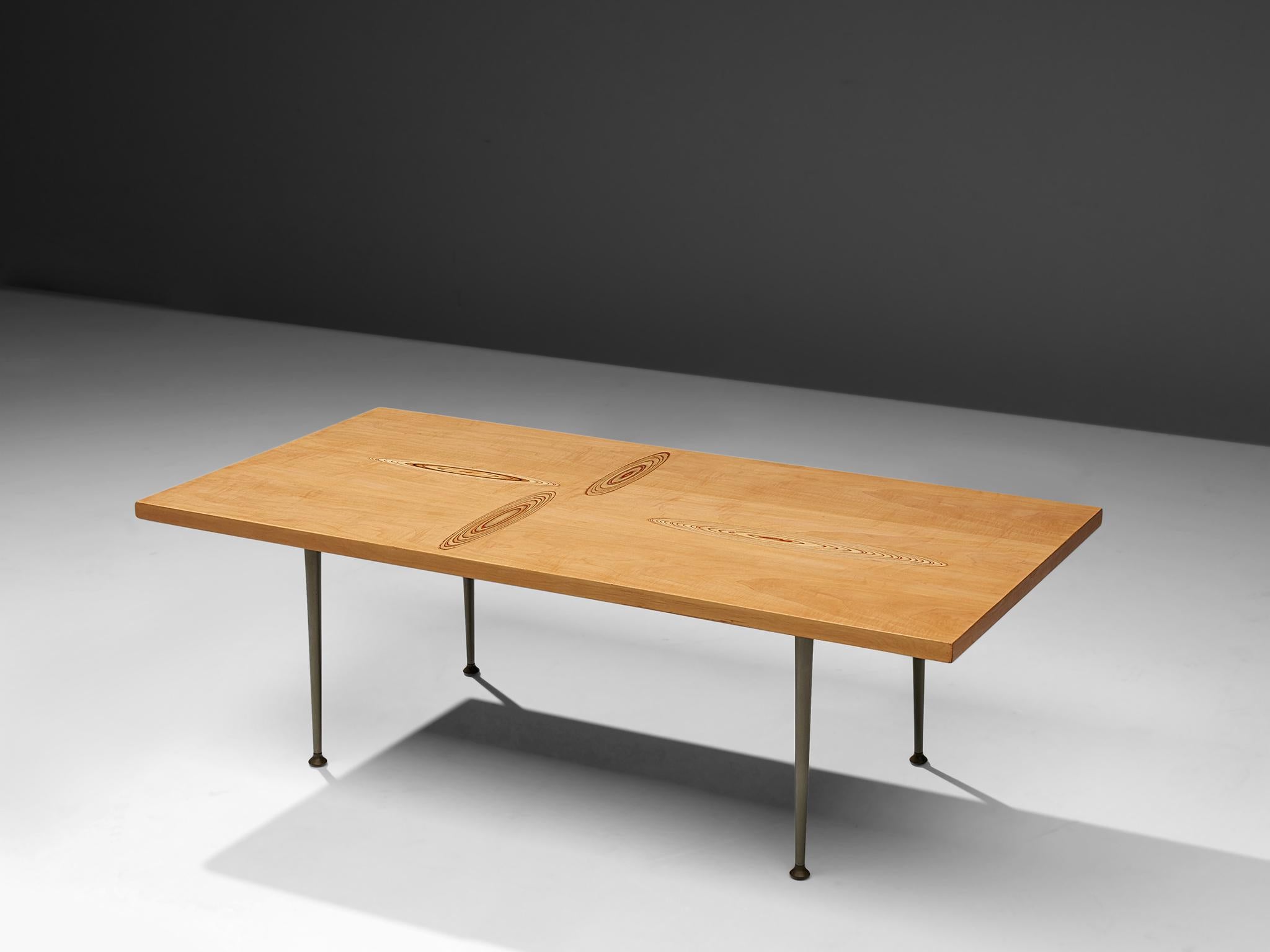 Tapio Wirkkala for Asko, cocktail table in birchwood and metal, Finland, 1960s. 

Coffee table with wooden inlay ornaments designed by Tapio Wirkala. The table is produced by Asko. This coffee table is one of Wirkkala's iconic furniture designs.