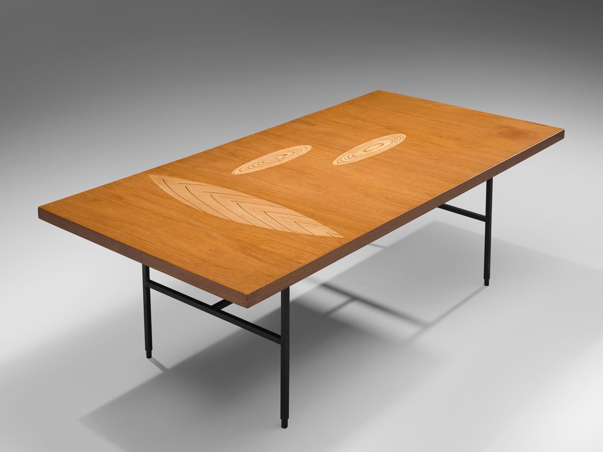 Tapio Wirkkala for Asko, cocktail table, oak, metal, Finland, 1960s.

Coffee table with wooden inlay ornaments designed by Tapio Wirkala. The table is produced by Asko. This coffee table is one of Wirkkala's iconic furniture designs. Made with three