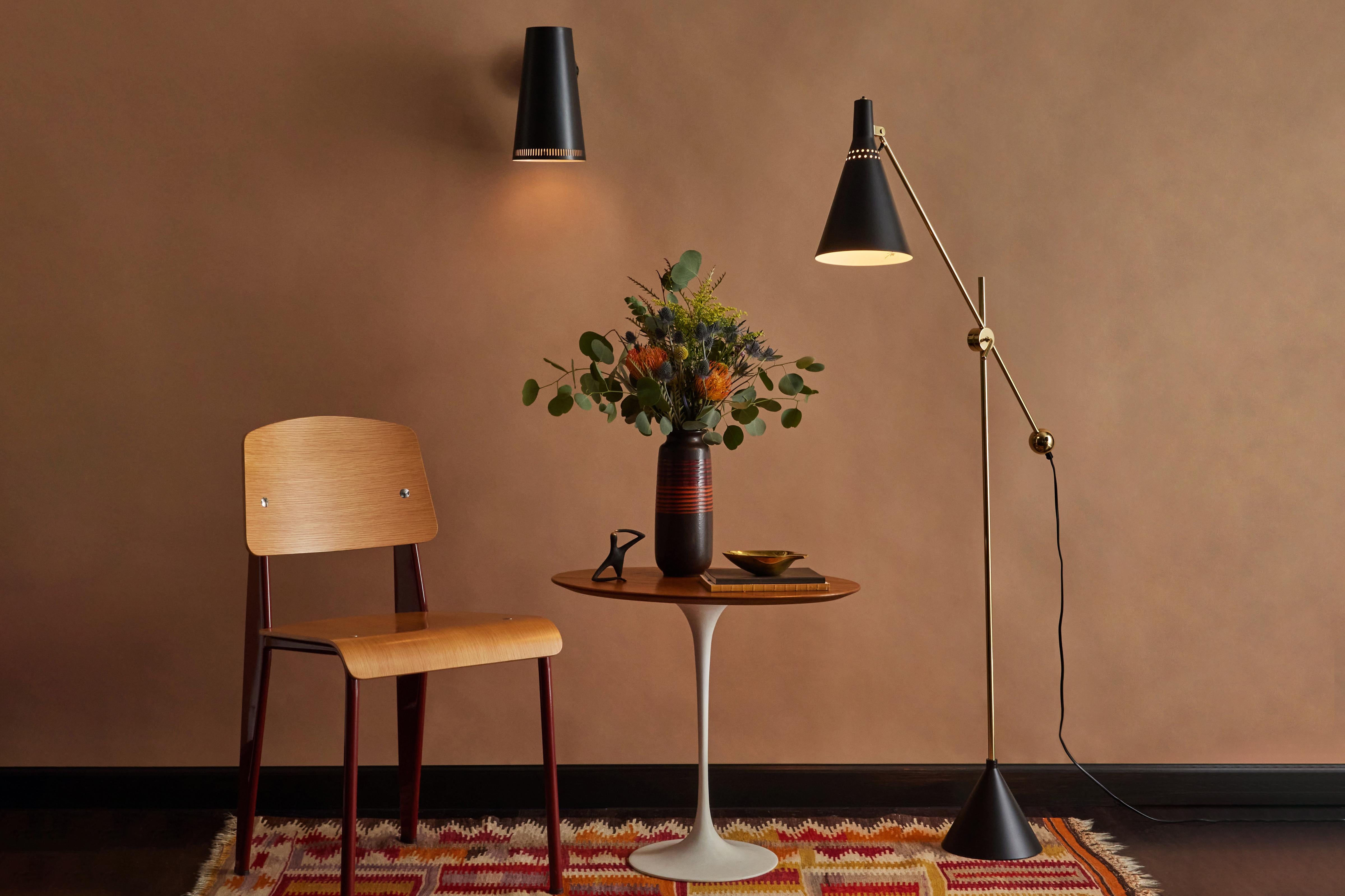 Tapio Wirkkala 'Crane' Articulating Floor Lamp in Black for Innolux Oy. Originally produced as the in the 1950s as the Model #K-10-11 by Idman, this newly authorized re-edition of the iconic lamp is made by Innolux Oy of Finland with the same