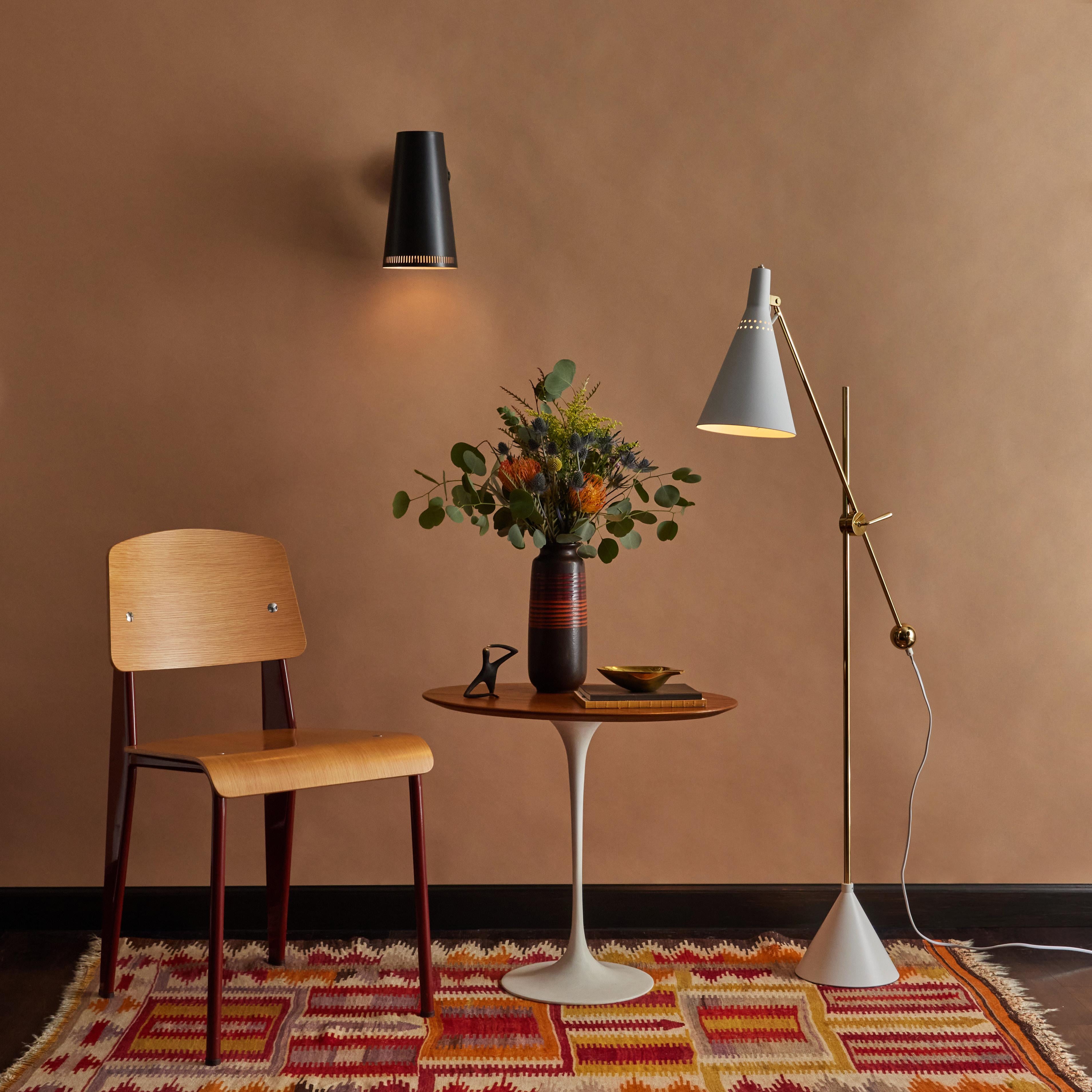Tapio Wirkkala 'Crane' Articulating Floor Lamp in White for Innolux Oy.  Originally produced as the in the 1950s as the Model #K-10-11 by Idman, this newly authorized re-edition of the iconic lamp is made by Innolux Oy of Finland with the same