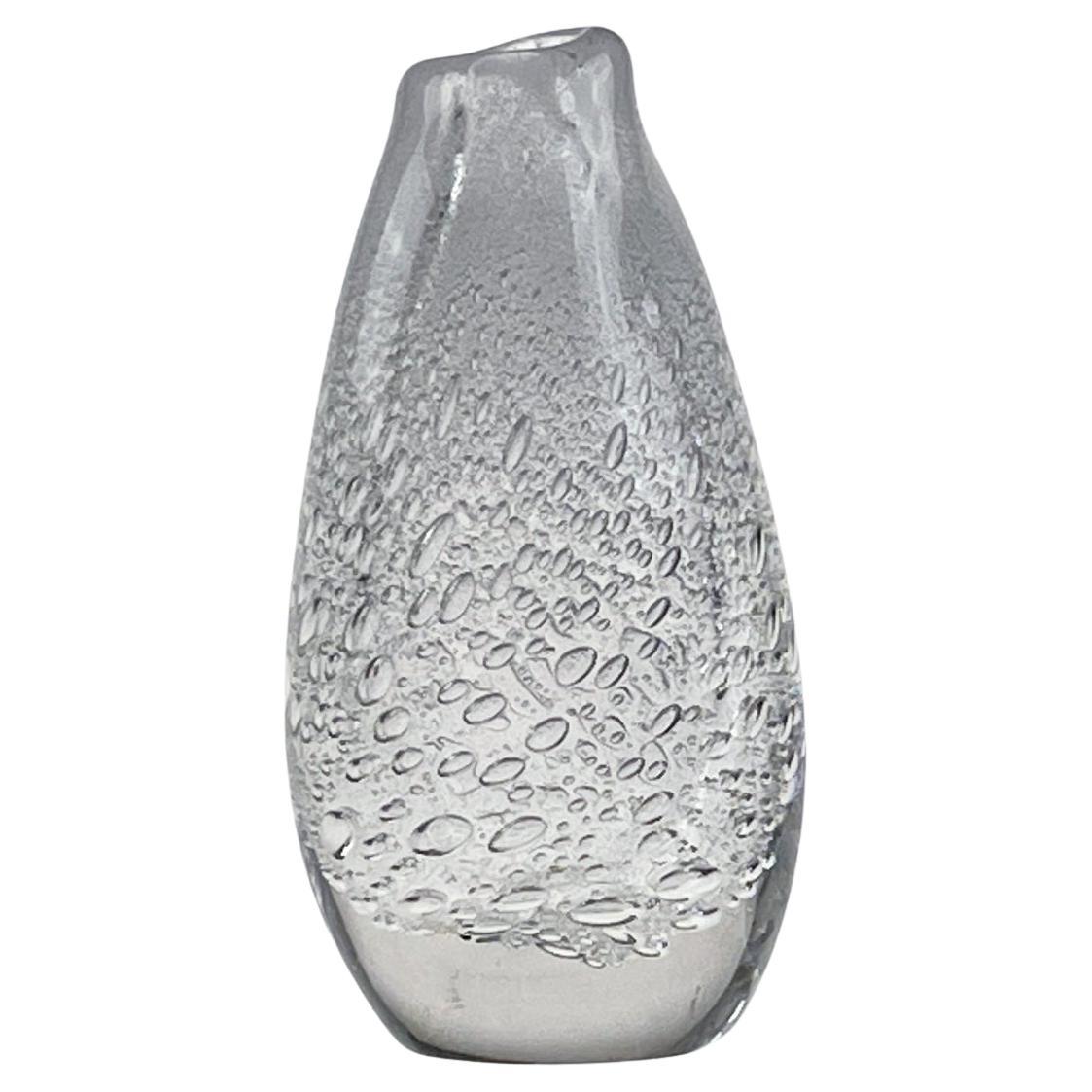 Tapio Wirkkala - Crystal Art-Object with sodium bubbles, model 3234 - Iittala, Finland circa 1948.

In 1947, Finnish designer Tapio Wirkkala created a stunning art-object that would become a sought-after piece for collectors and enthusiasts of