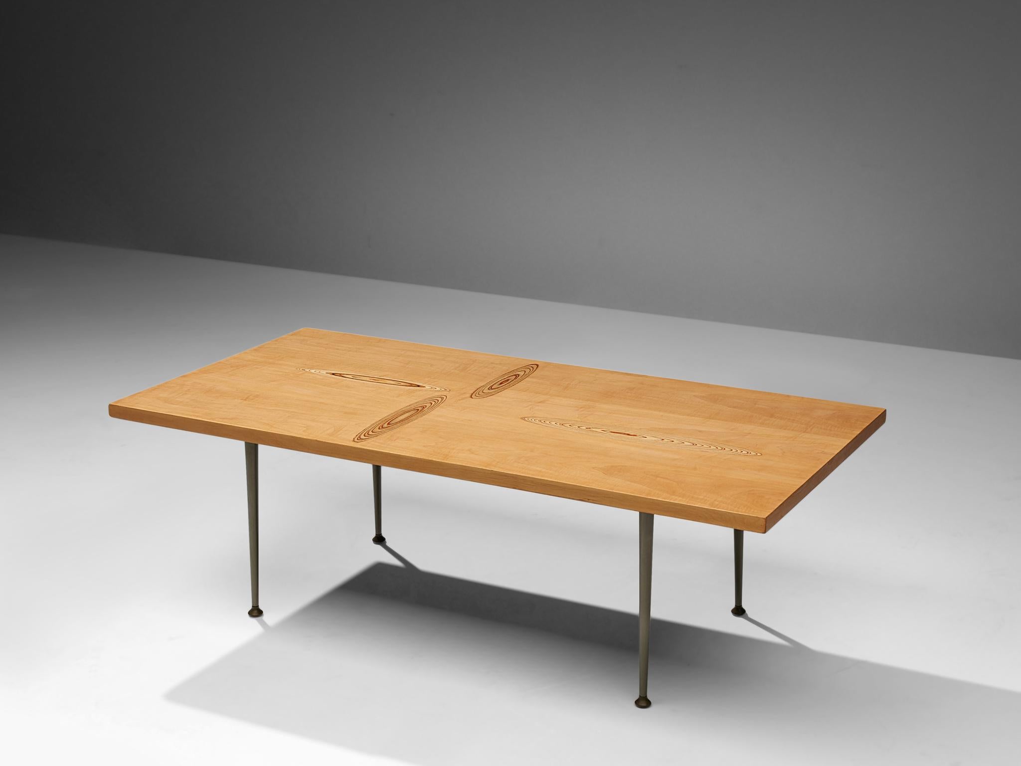 Tapio Wirkkala for Asko, coffee table, birch, metal, Finland, 1960s.

Coffee table with wooden inlay motifs designed by Tapio Wirkkala. The table is produced by Asko. This coffee table is one of Wirkkala's iconic furniture designs. Made with four