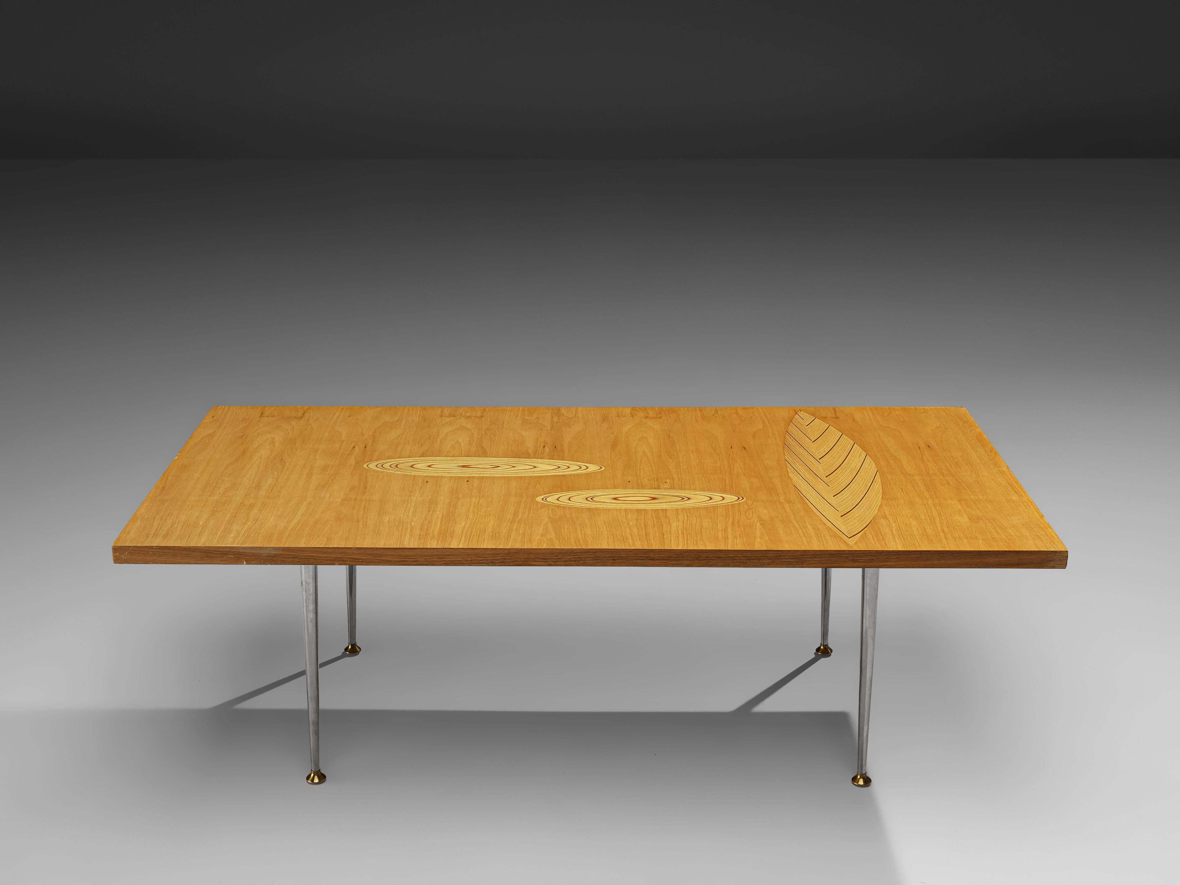 Tapio Wirkkala for Asko, side table, birch, plywood, steel, brass, Finland, 1960s

Coffee table with plywood inlays designed by Tapio Wirkkala, manufactured by Asko. This rectangular coffee table is one of Wirkkala's iconic furniture designs.