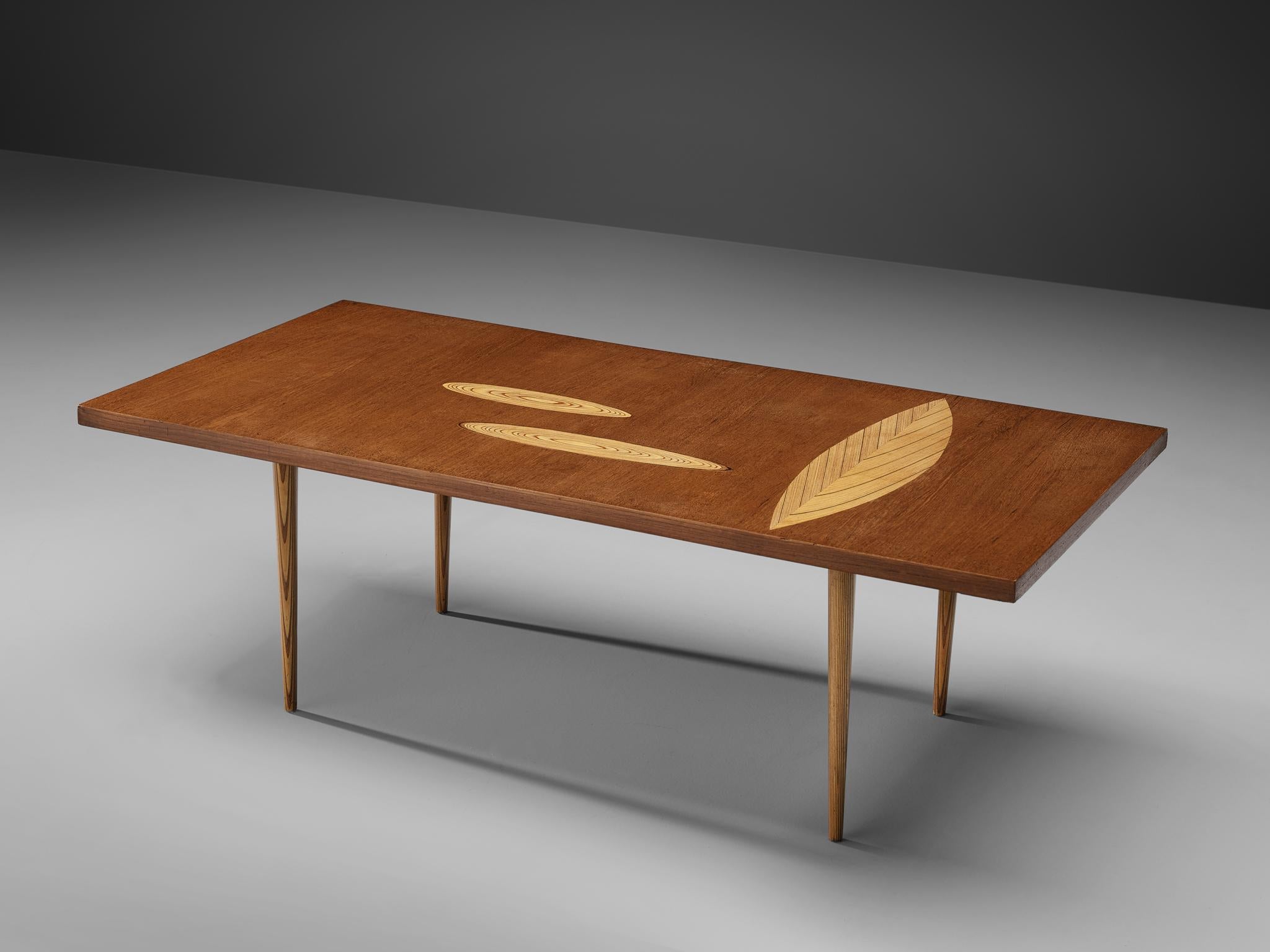 Tapio Wirkkala for Asko, cocktail table, teak, Finland, 1960s.

Teak coffee table with wooden inlay ornaments designed by Tapio Wirkkala. The table is produced by Asko. This coffee table is one of Wirkkala's iconic furniture designs. Made with three