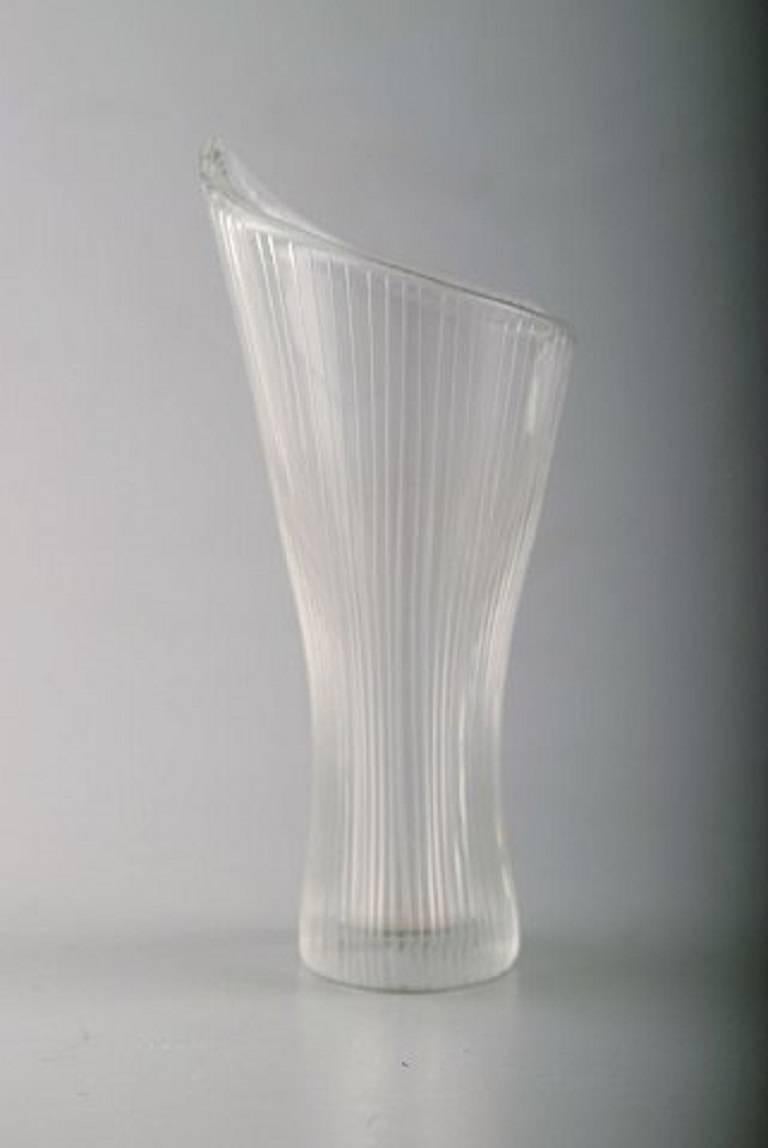 Tapio Wirkkala for Iittala.
Clear art glass vase with engraved decoration in form of stripes.
Signed Tapio Wirkkala Iittala. 1955. Finland. Finnish design.
Measures : 11 cm. x 5 cm.
In perfect condition.