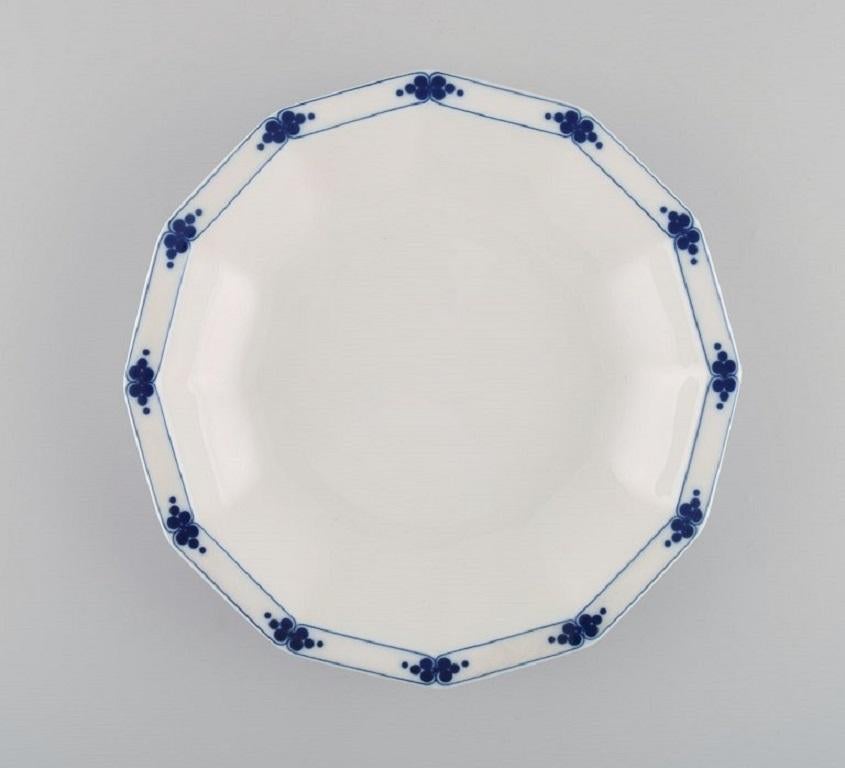 Tapio Wirkkala for Rosenthal. 11 deep Corinth plates in blue painted porcelain. Modernist Finnish design. 
Dated 1979-80.
Measures: 22 x 3.8 cm.
In excellent condition.
Stamped.