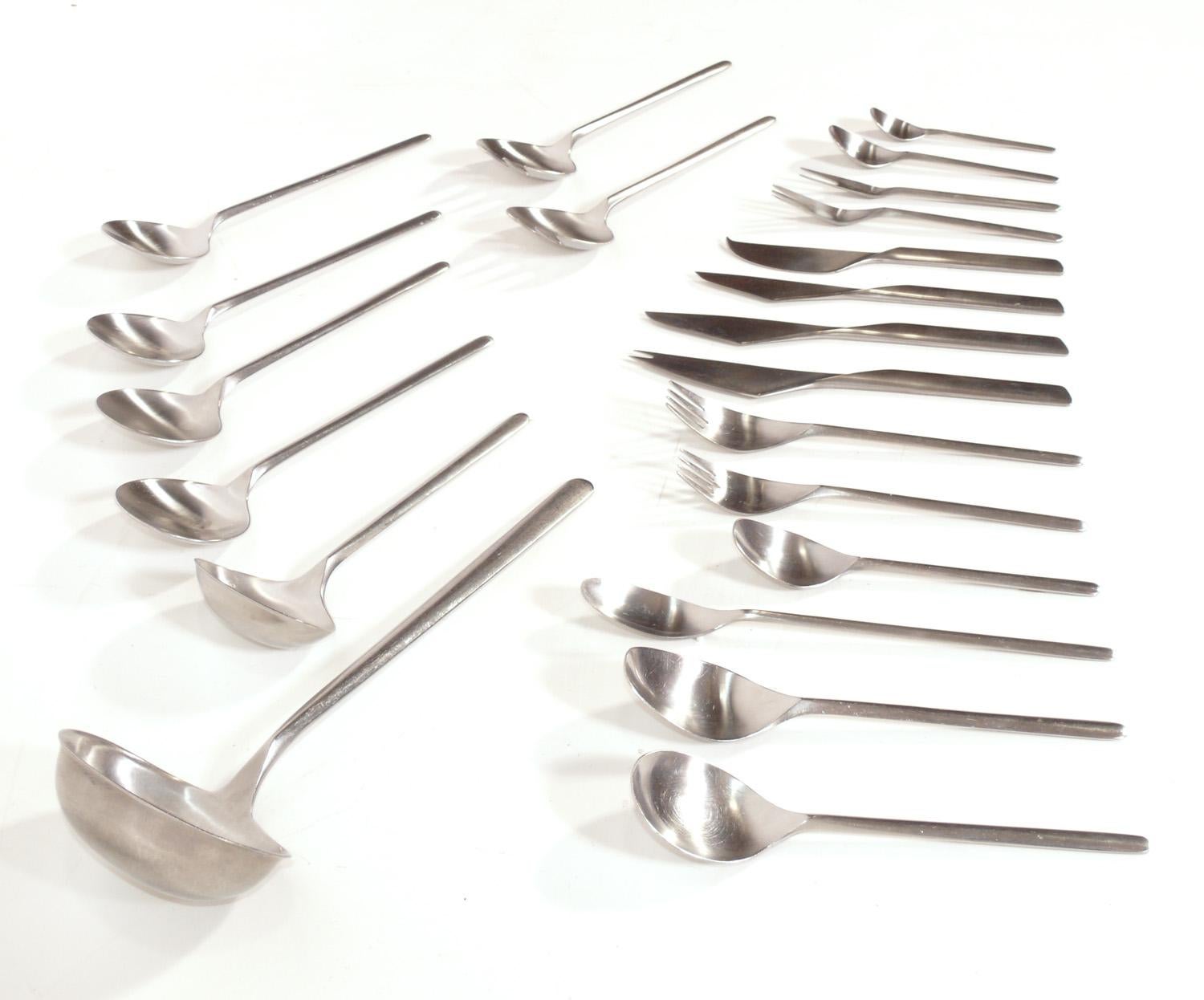 Modernist stainless steel flatware set, designed by Tapio Wirkkala for Rosenthal, Austria, circa 1963. This is a large set containing 92 pieces total. They are constructed of dishwasher safe stainless steel, making them a great choice for a 
